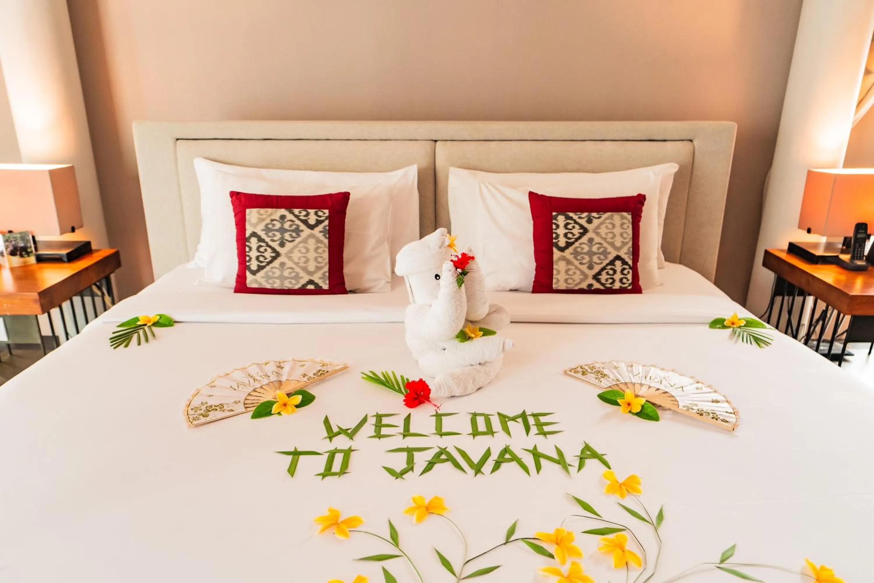 Bed in Javana Royal Villas