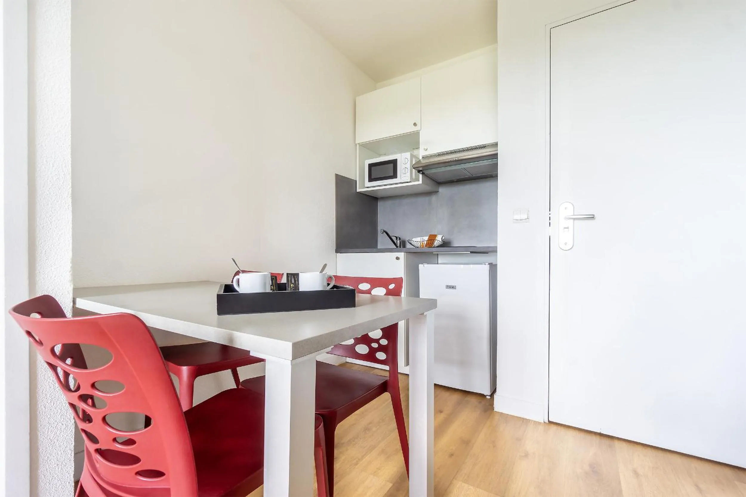 Kitchen or kitchenette in City Résidence Chelles