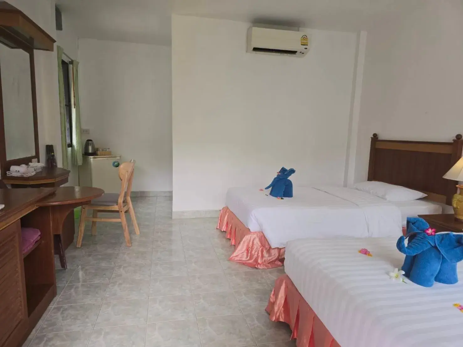 Bed in D.R. Lanta Bay Resort Bed in D.R. Lanta Bay Resort