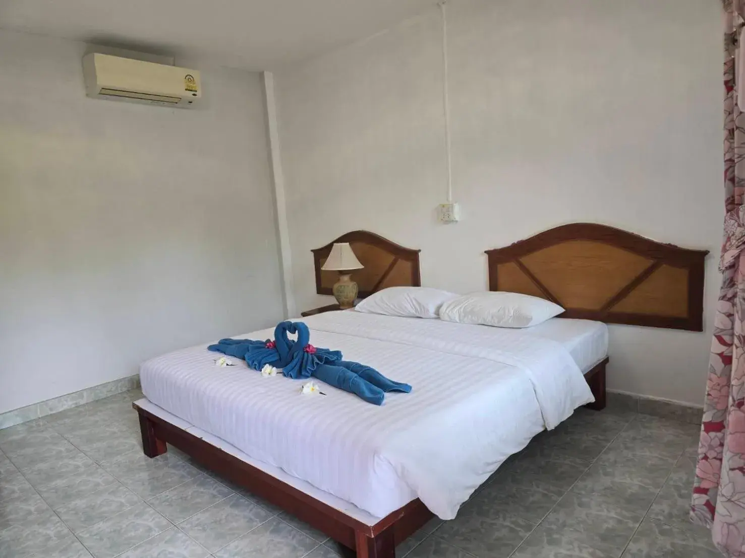 Bed in D.R. Lanta Bay Resort Bed in D.R. Lanta Bay Resort