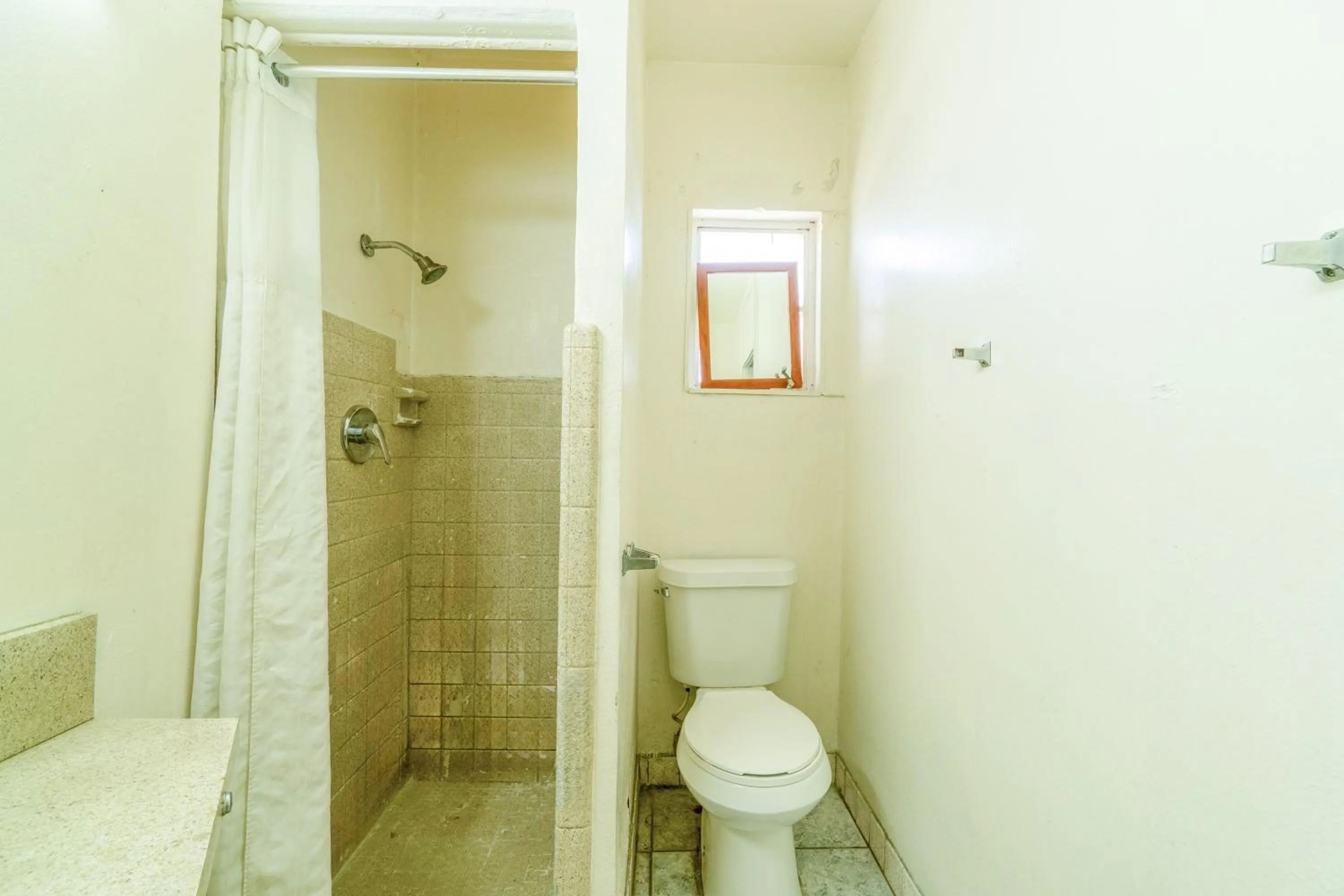 Bathroom in Gulfway Motel By OYO Near Airport I 37