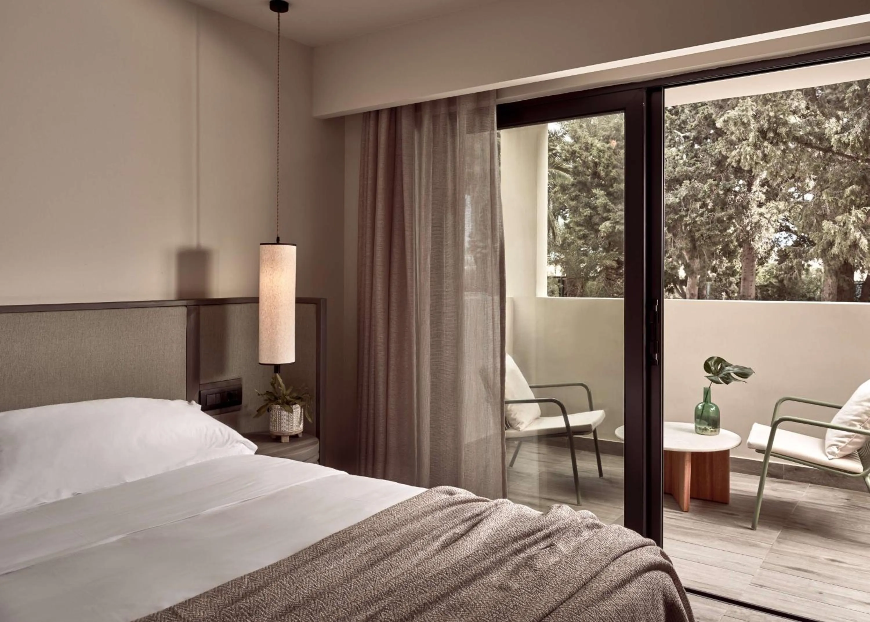 Bed in Numo Ierapetra Beach Resort Crete, Adults only, Curio Collection Hilton