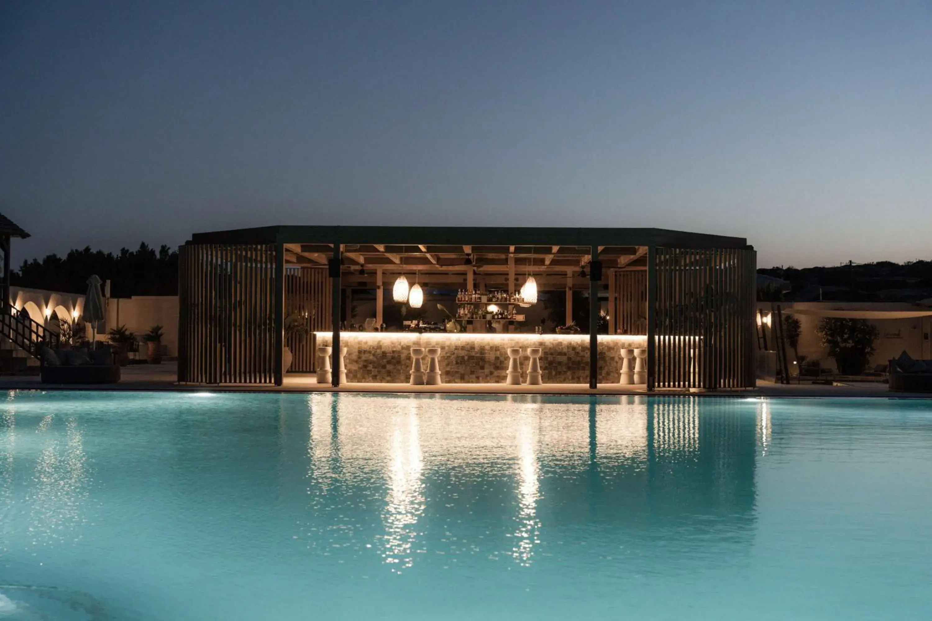 Pool view in Numo Ierapetra Beach Resort Crete, Adults only, Curio Collection Hilton Pool view in Numo Ierapetra Beach Resort Crete, Adults only, Curio Collection Hilton