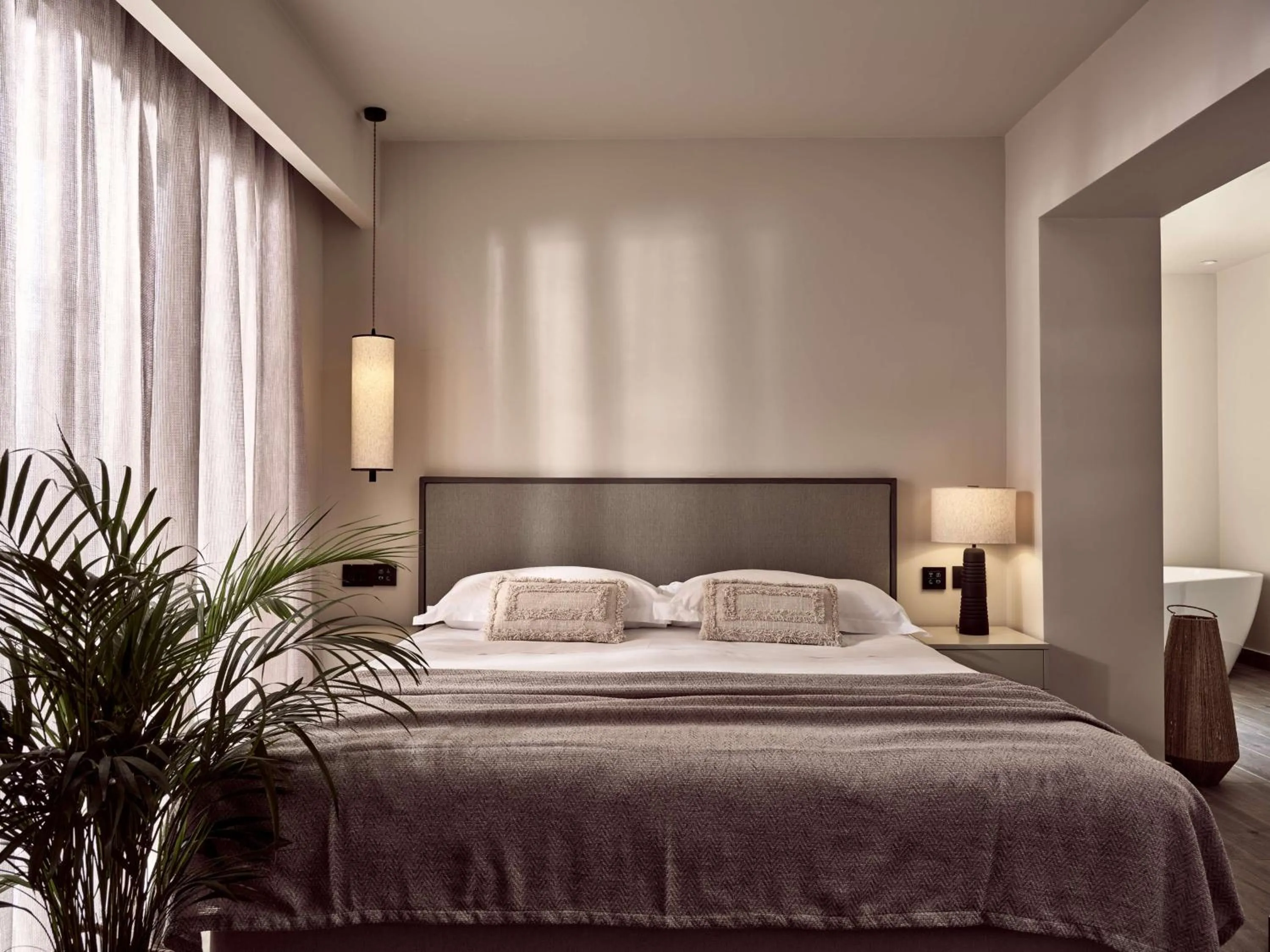 Bed in Numo Ierapetra Beach Resort Crete, Adults only, Curio Collection Hilton