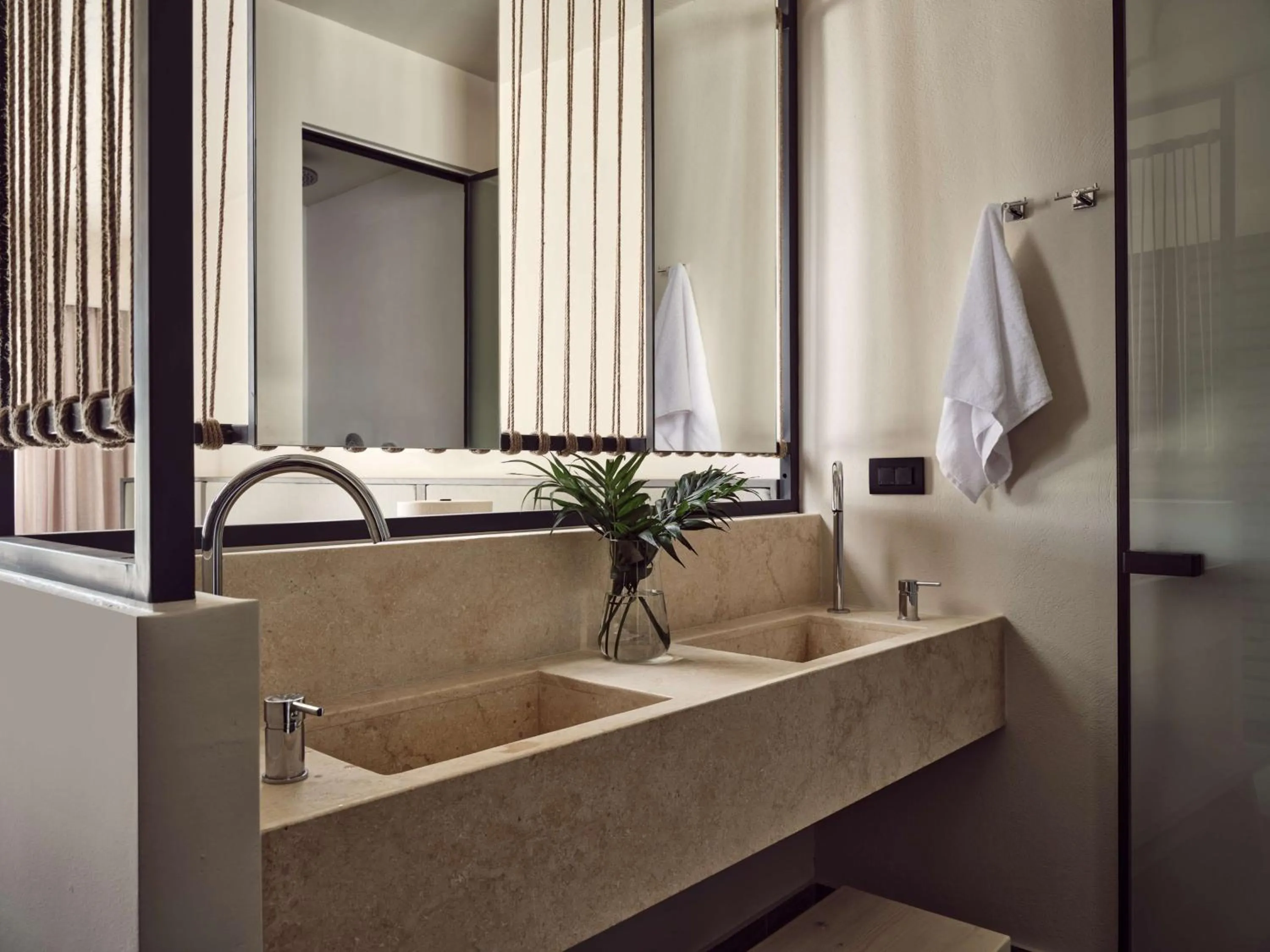 Bathroom in Numo Ierapetra Beach Resort Crete, Adults only, Curio Collection Hilton