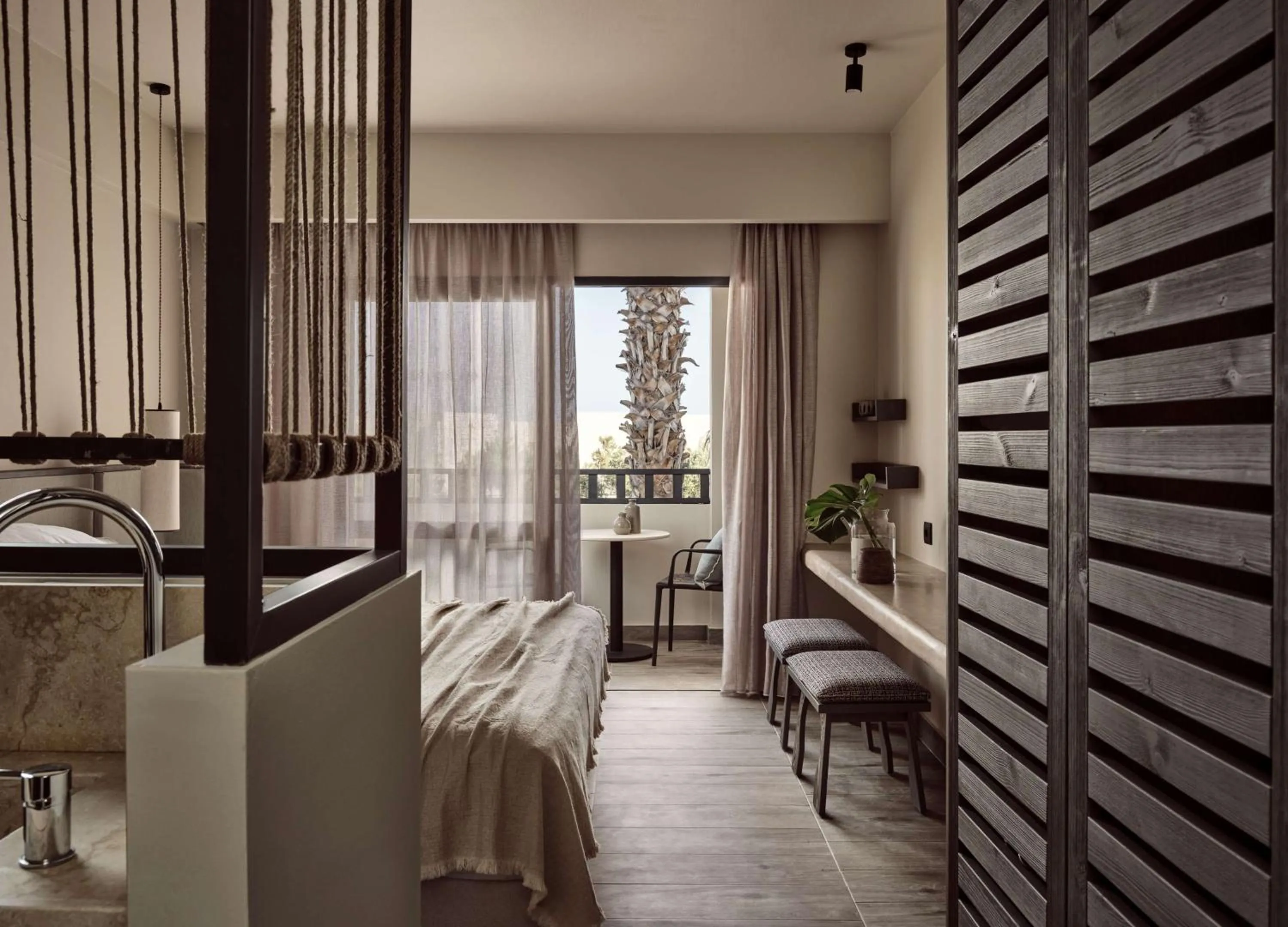 Bed in Numo Ierapetra Beach Resort Crete, Adults only, Curio Collection Hilton