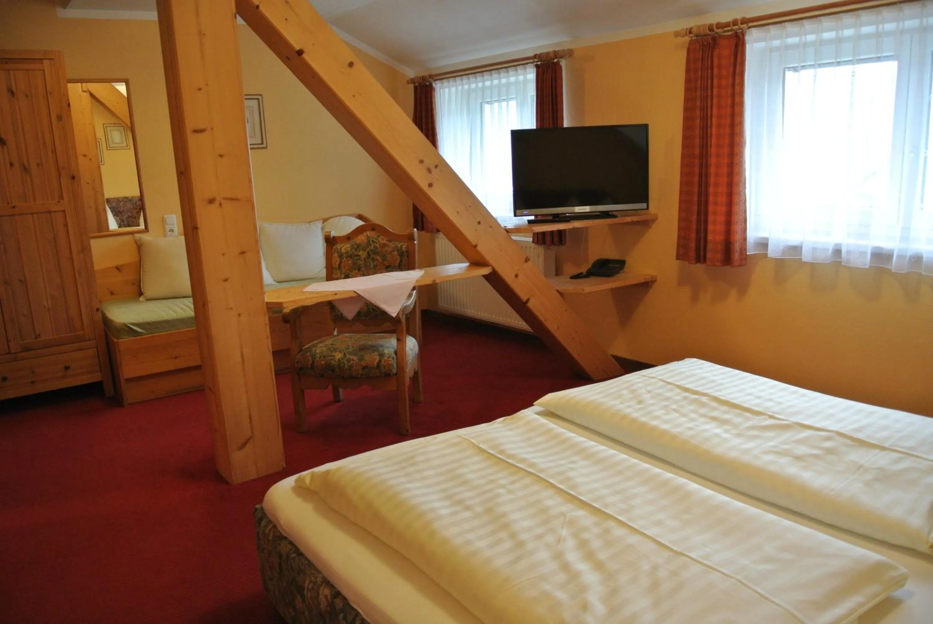 Photo of the whole room, Bed in Kirchenwirt Gosau