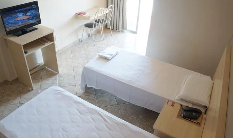 Bed in Manhuaçu Center Hotel