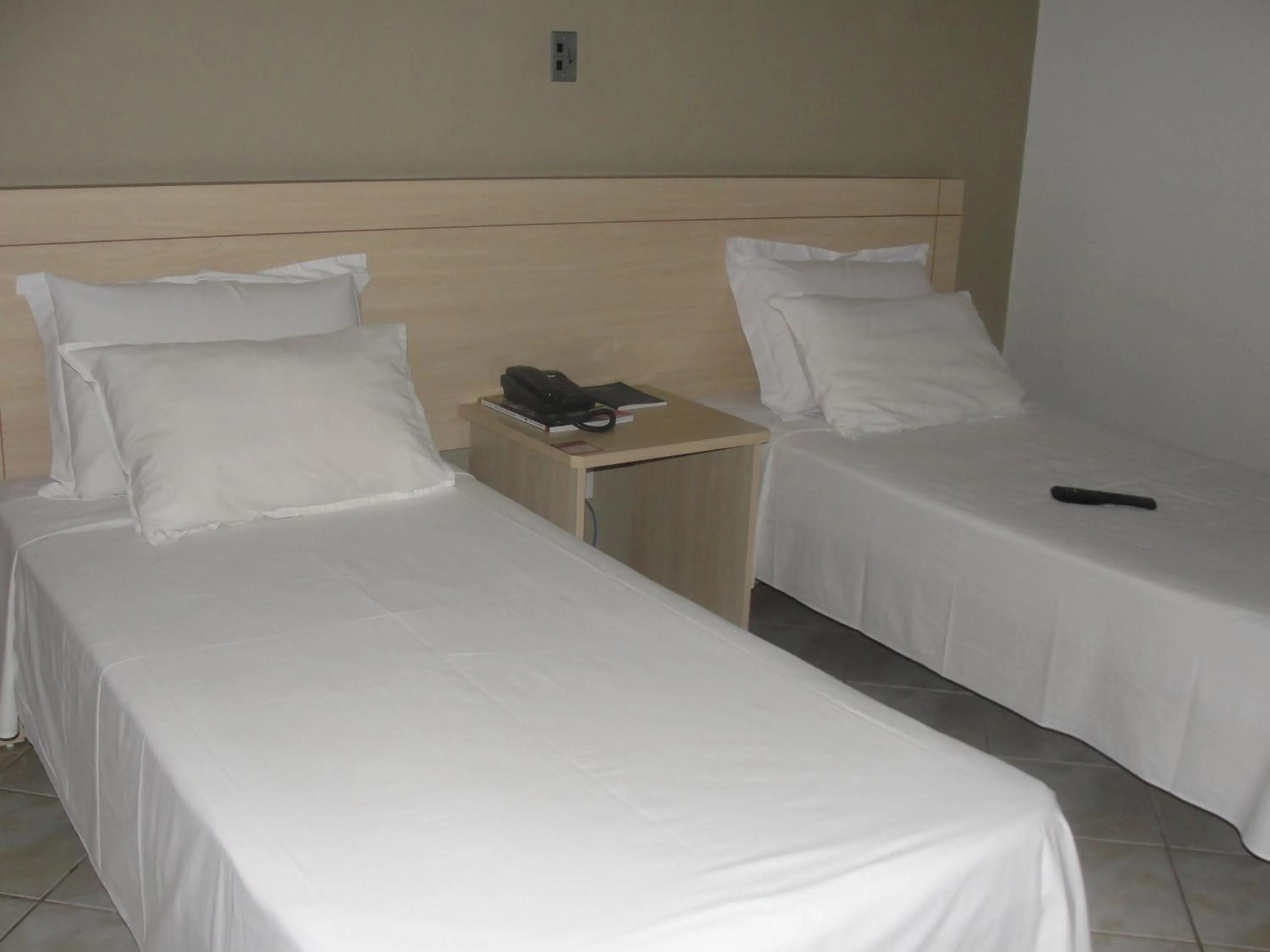Bed in Manhuaçu Center Hotel