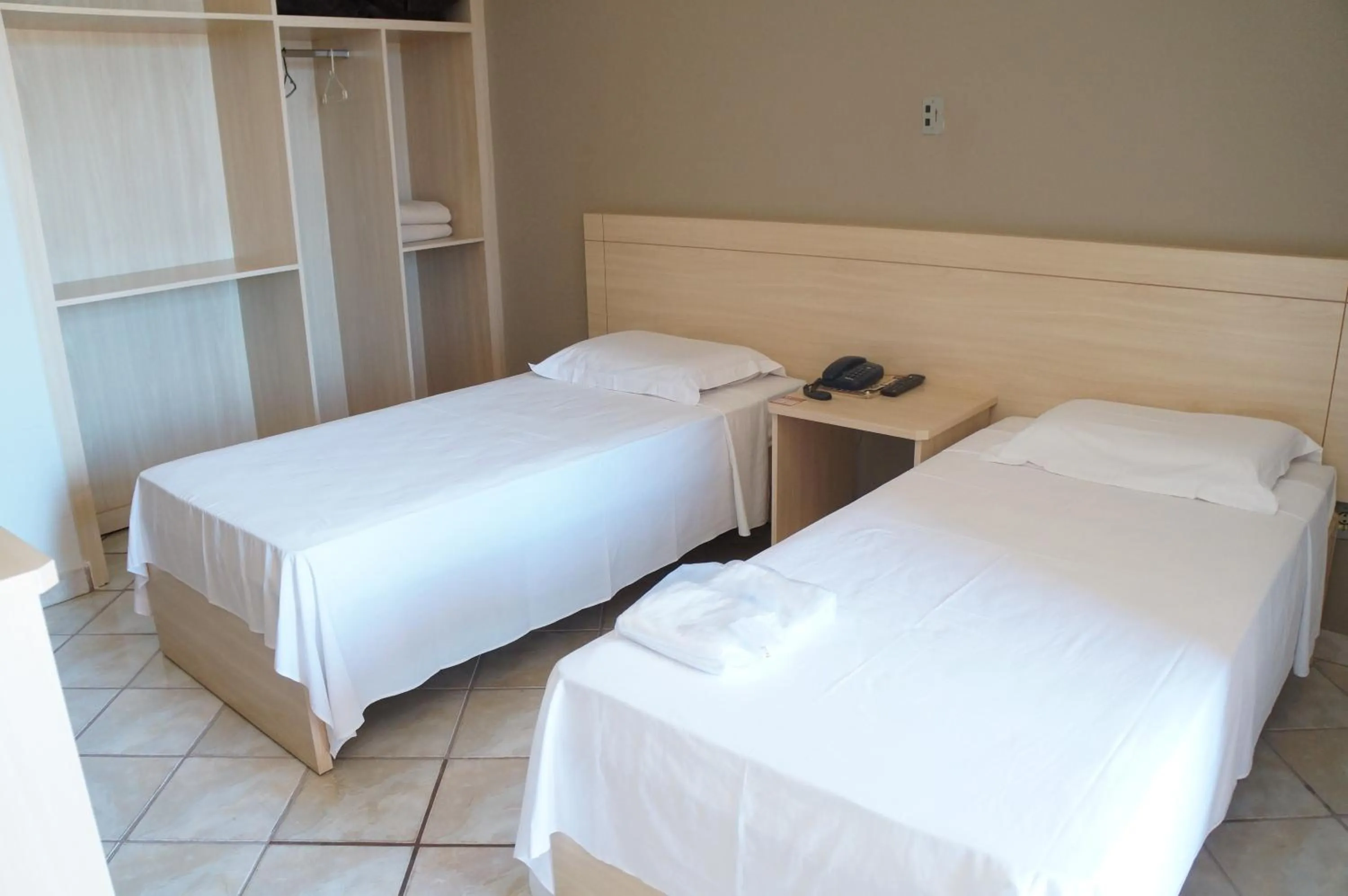 Bed in Manhuaçu Center Hotel