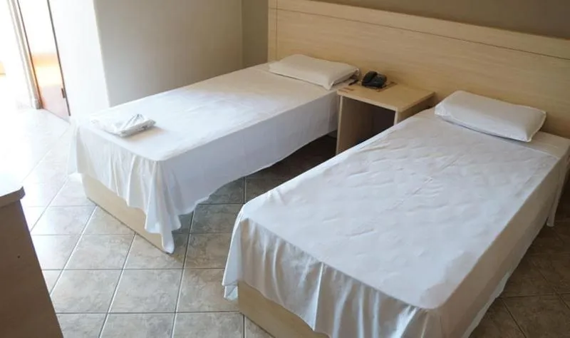 Bed in Manhuaçu Center Hotel