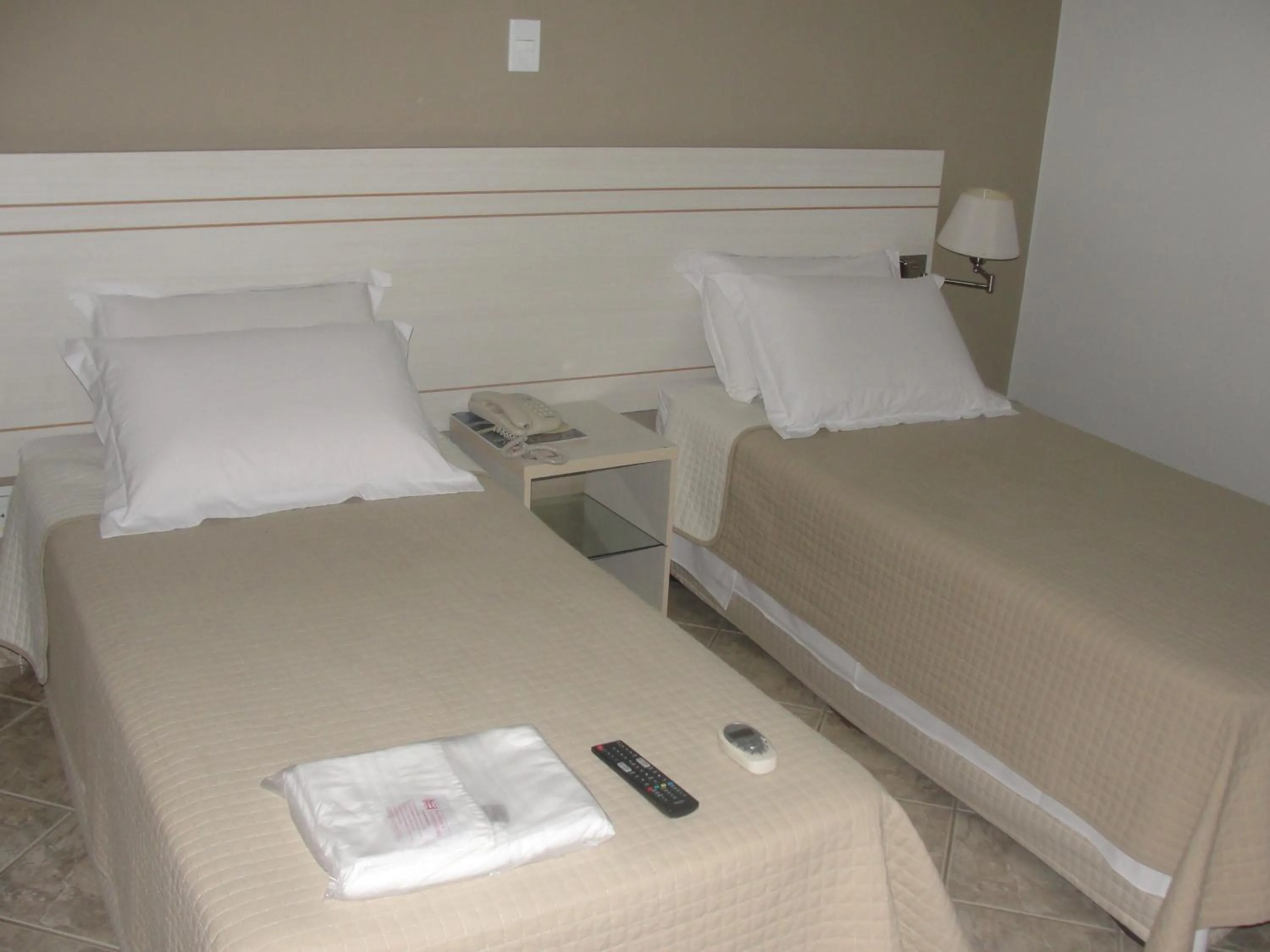 Bed in Manhuaçu Center Hotel