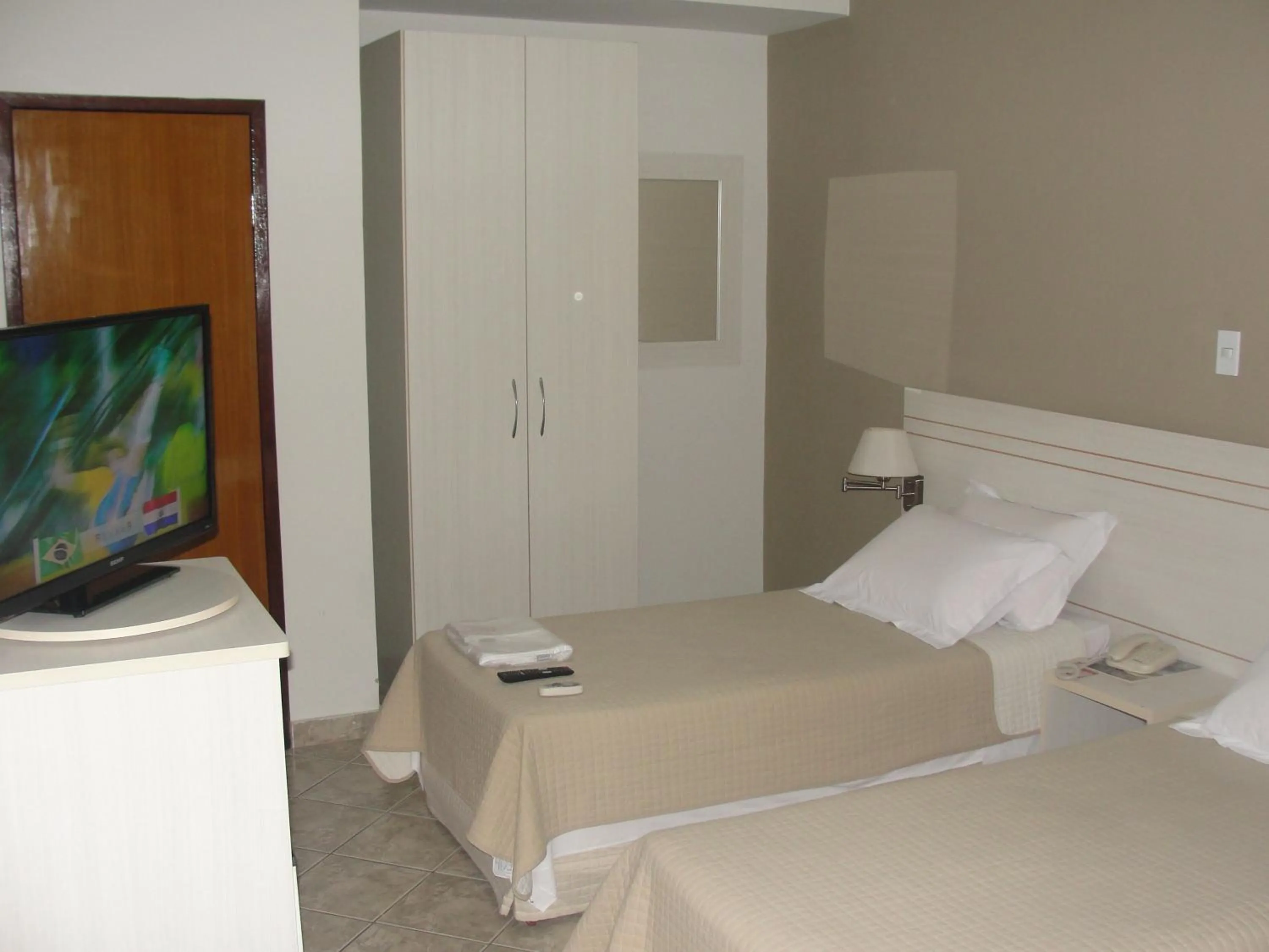 Bed in Manhuaçu Center Hotel