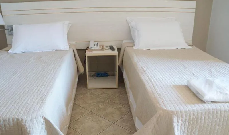 Bed in Manhuaçu Center Hotel