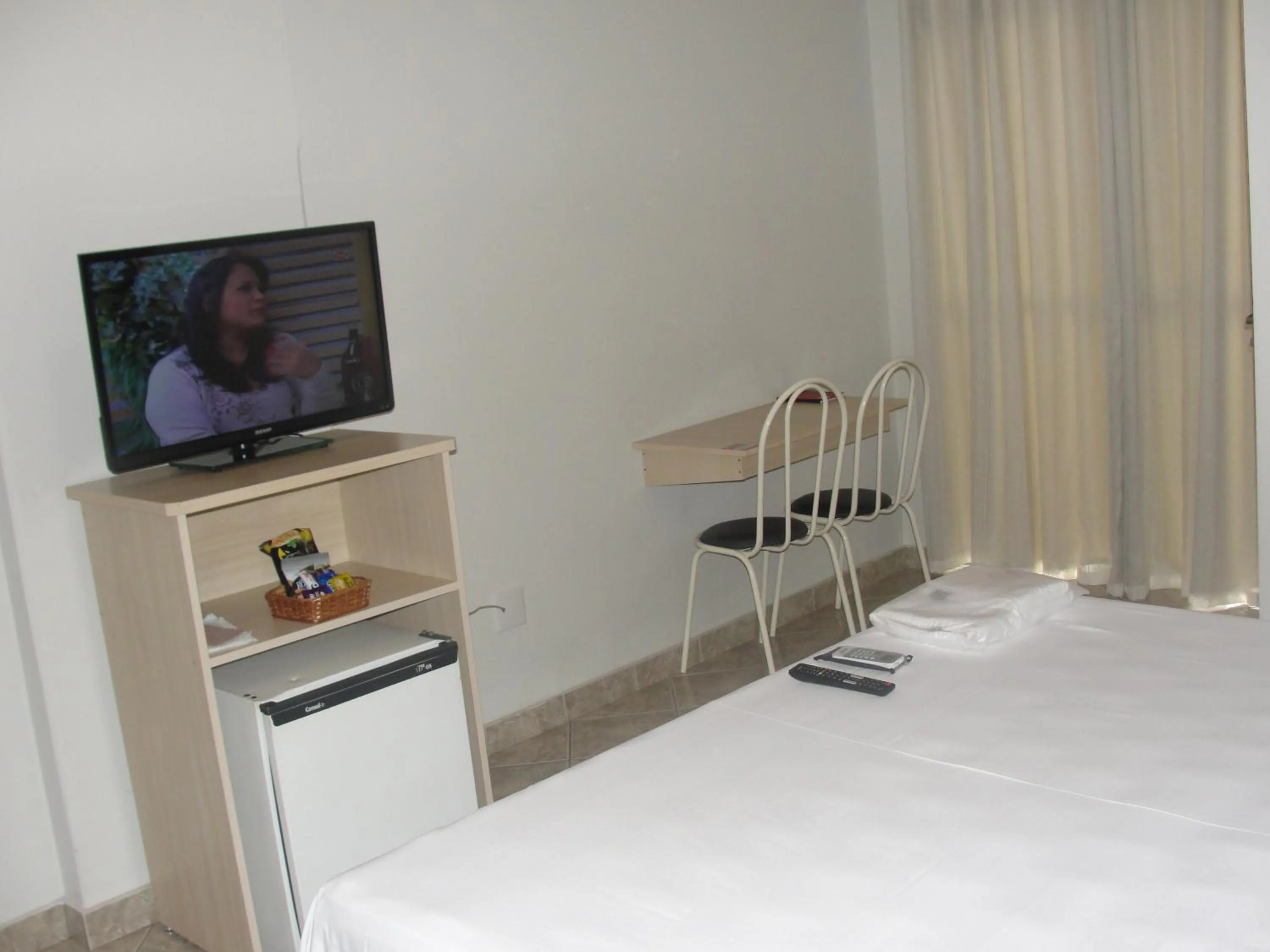 Bed in Manhuaçu Center Hotel