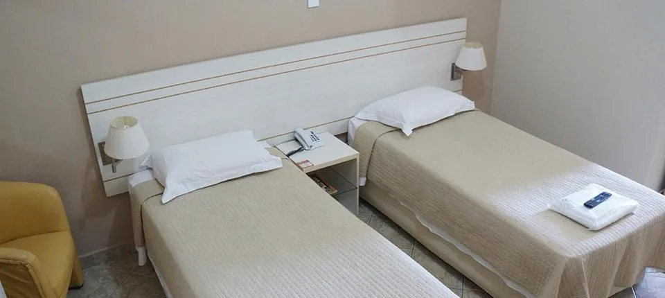 Bed in Manhuaçu Center Hotel