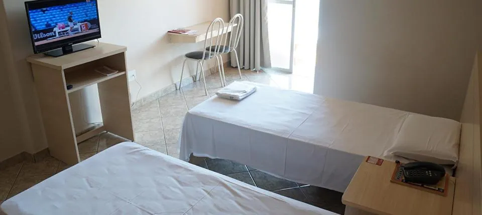 Bed in Manhuaçu Center Hotel