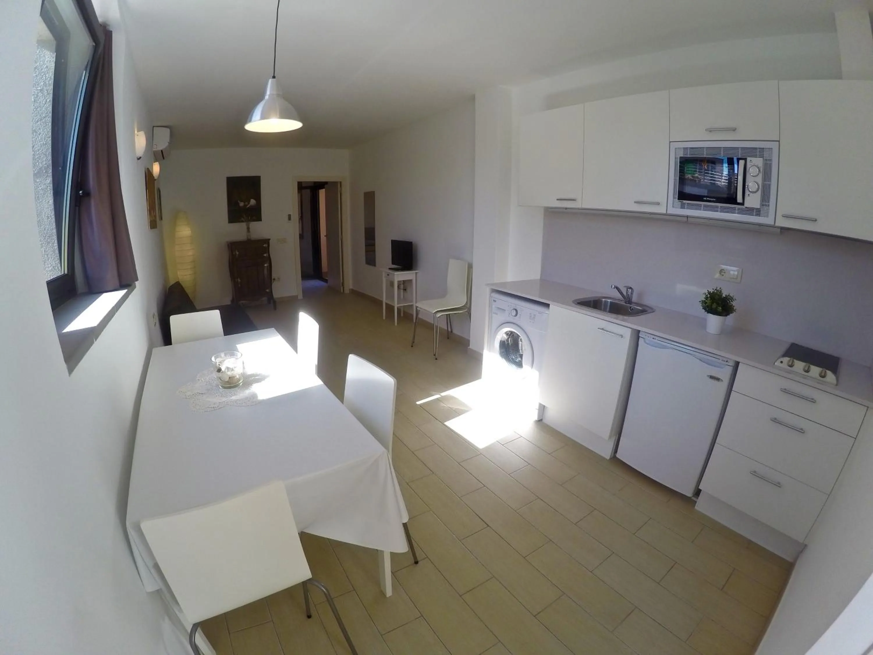 Kitchen or kitchenette in Apartaments Fonda Comerç