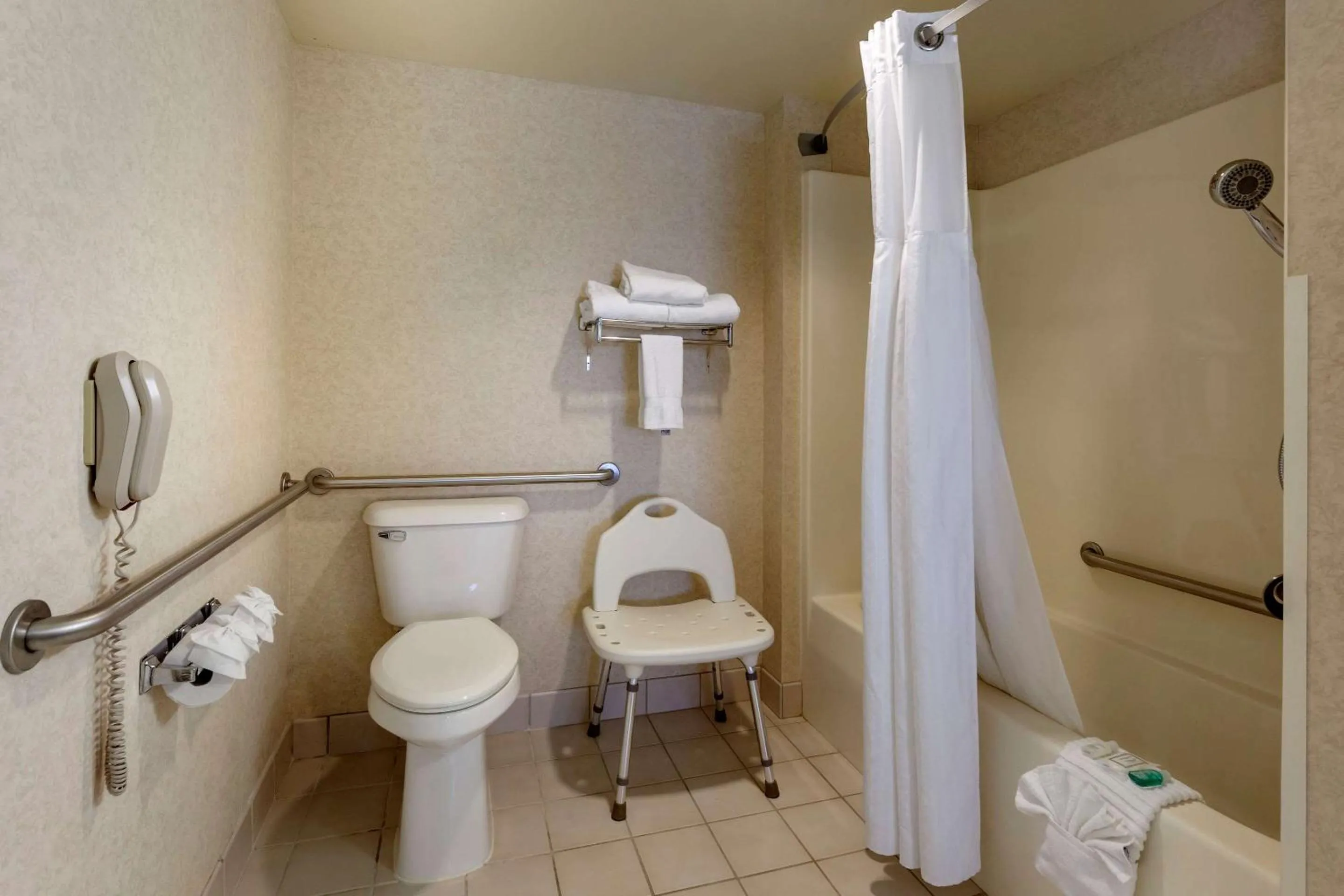 Bedroom in Clarion Suites at The Alliant Energy Center