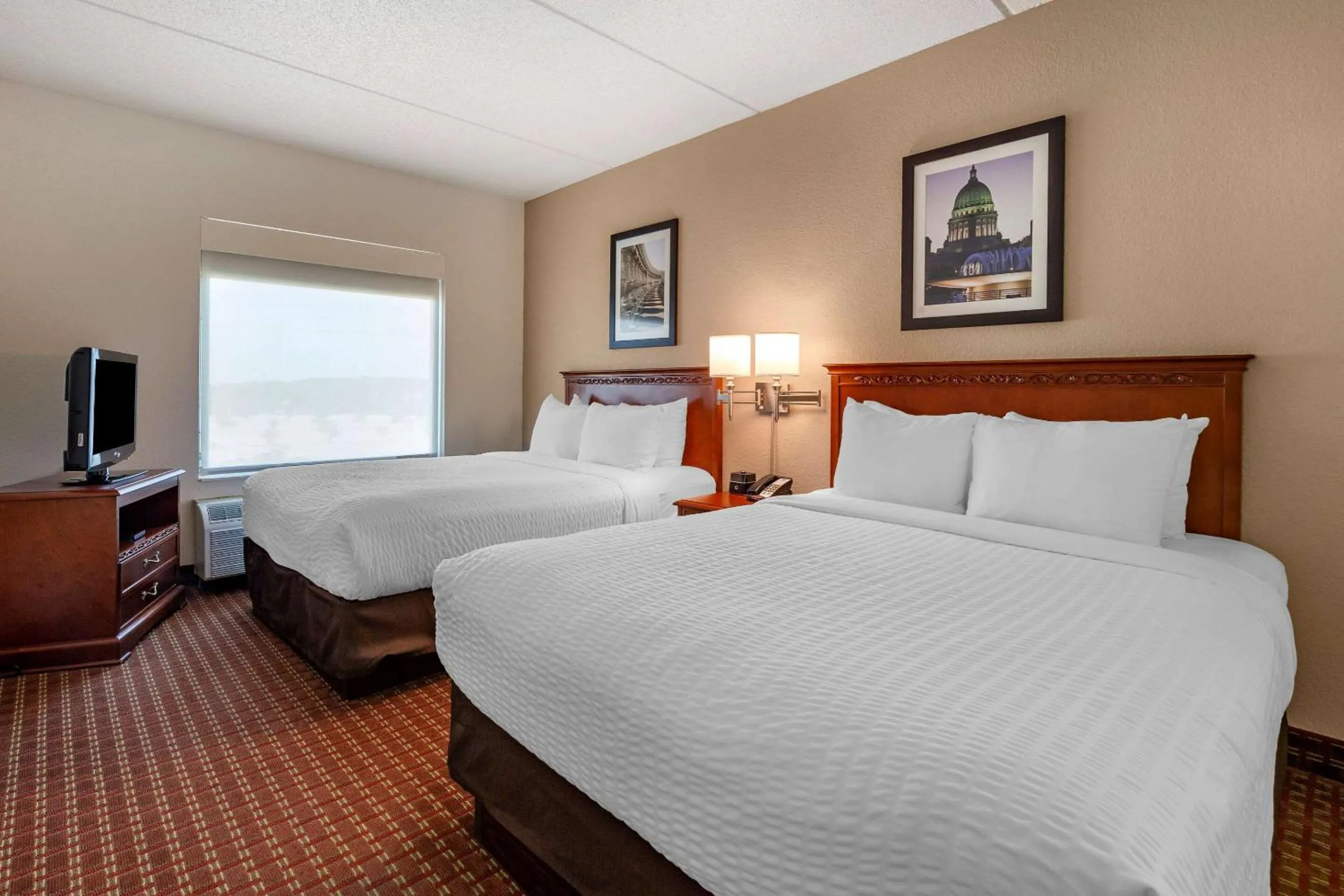 Bedroom in Clarion Suites at The Alliant Energy Center