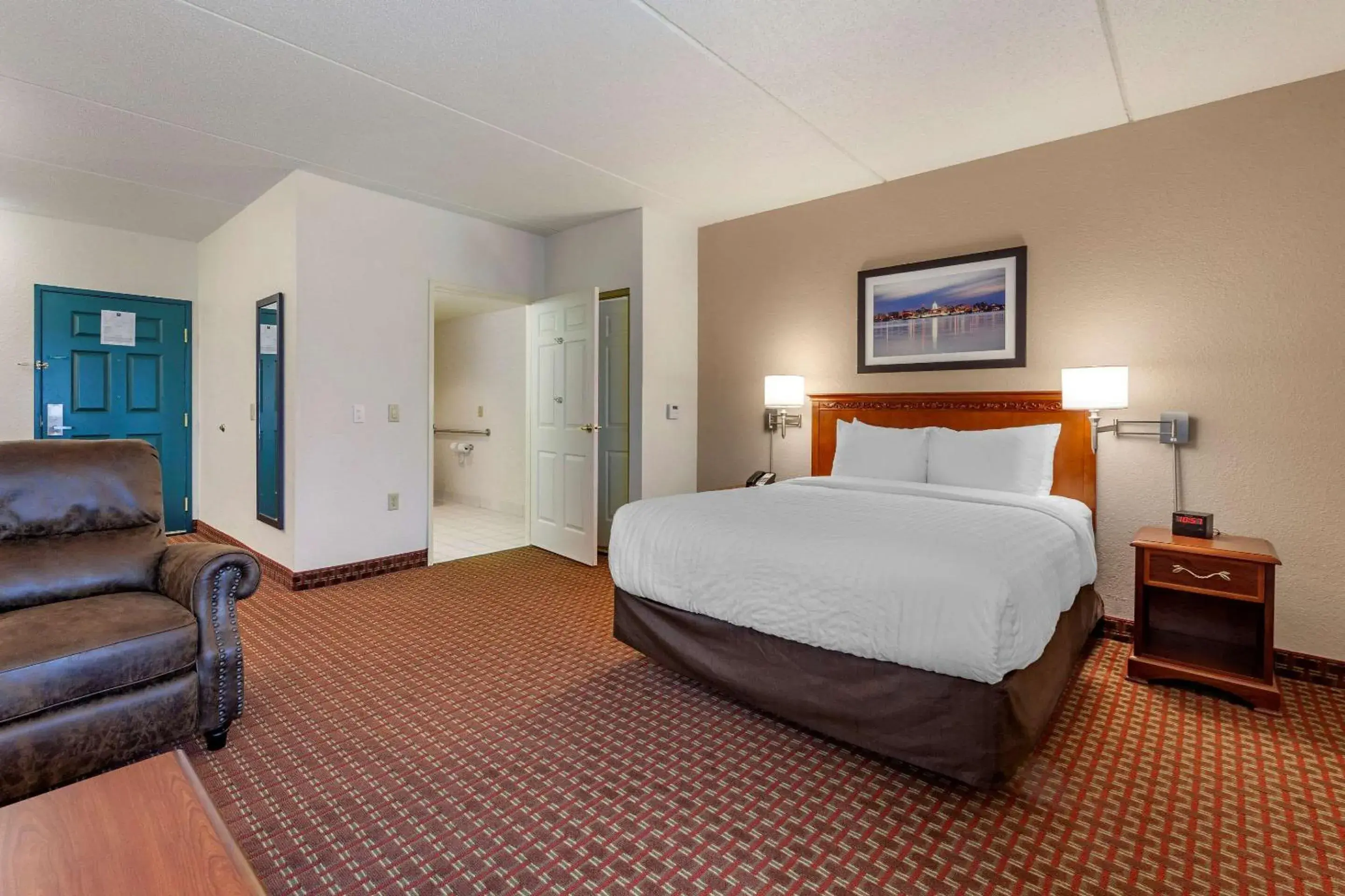 Business Queen Suite with Roll-In Shower - single occupancy - Accessible/Non-Smoking in Clarion Suites at the Alliant Energy Center Business Queen Suite with Roll-In Shower - single occupancy - Accessible/Non-Smoking in Clarion Suites at the Alliant Energy Center