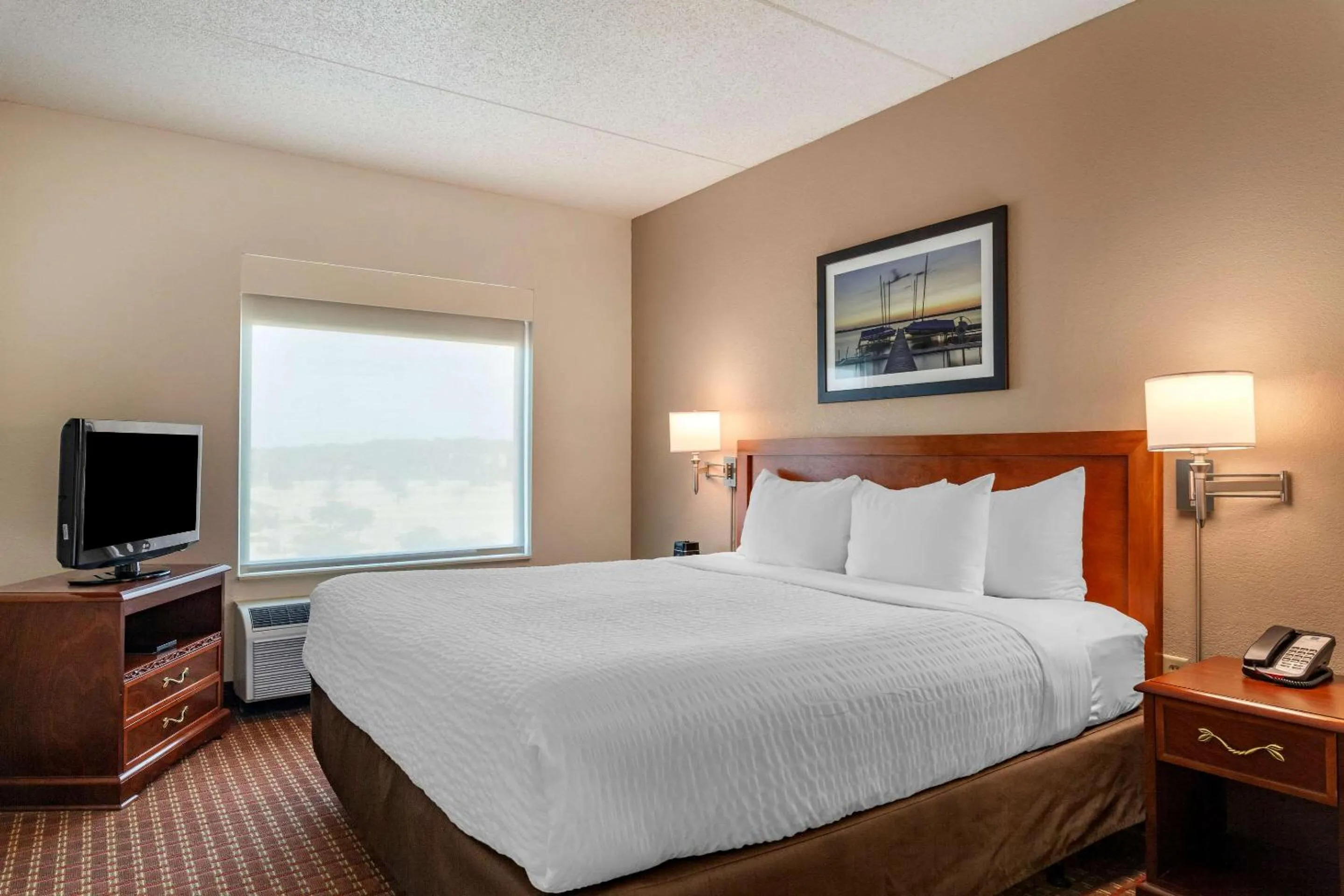 Bedroom in Clarion Suites at The Alliant Energy Center