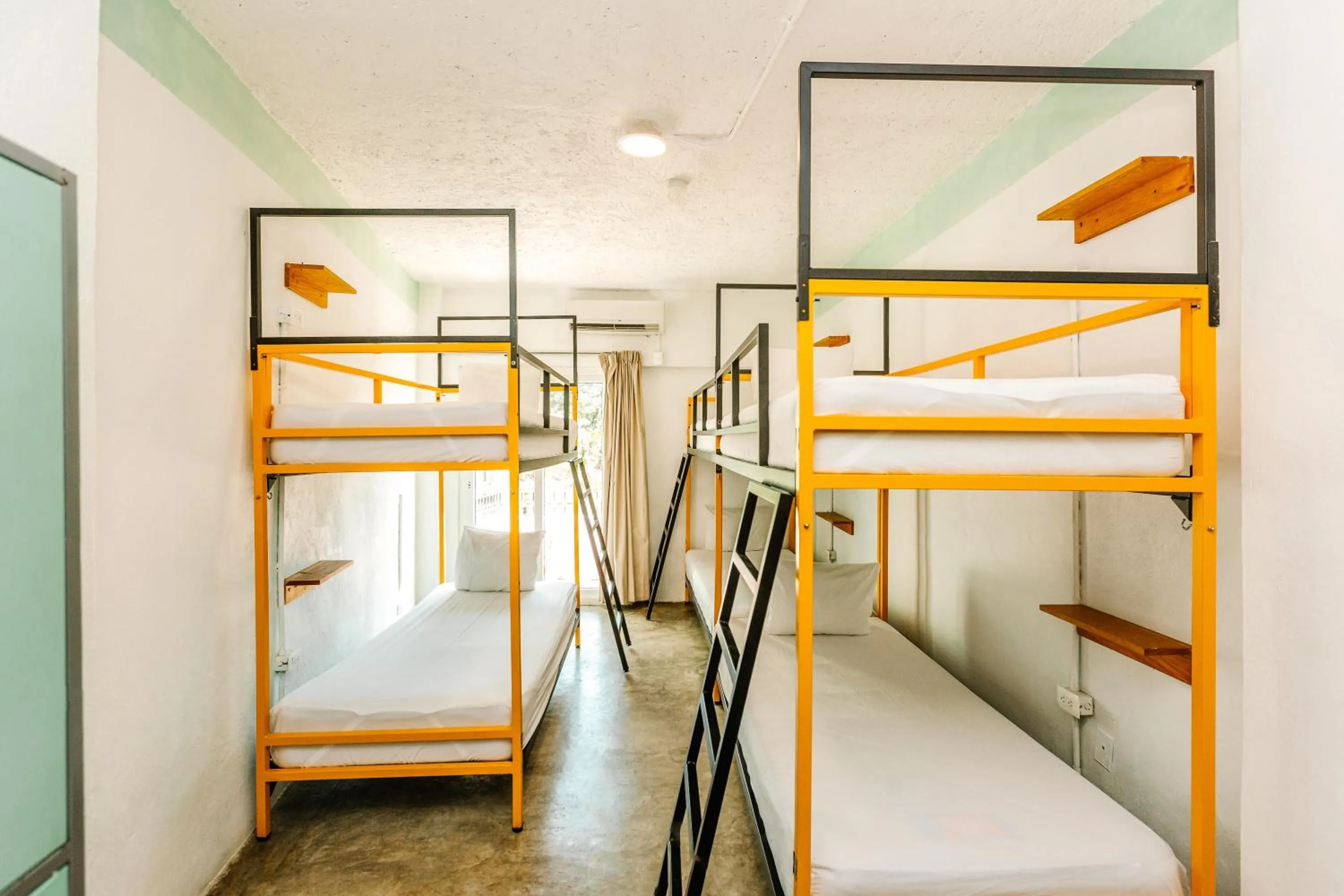 bunk bed in Nílu Cancun Downtown by Selina