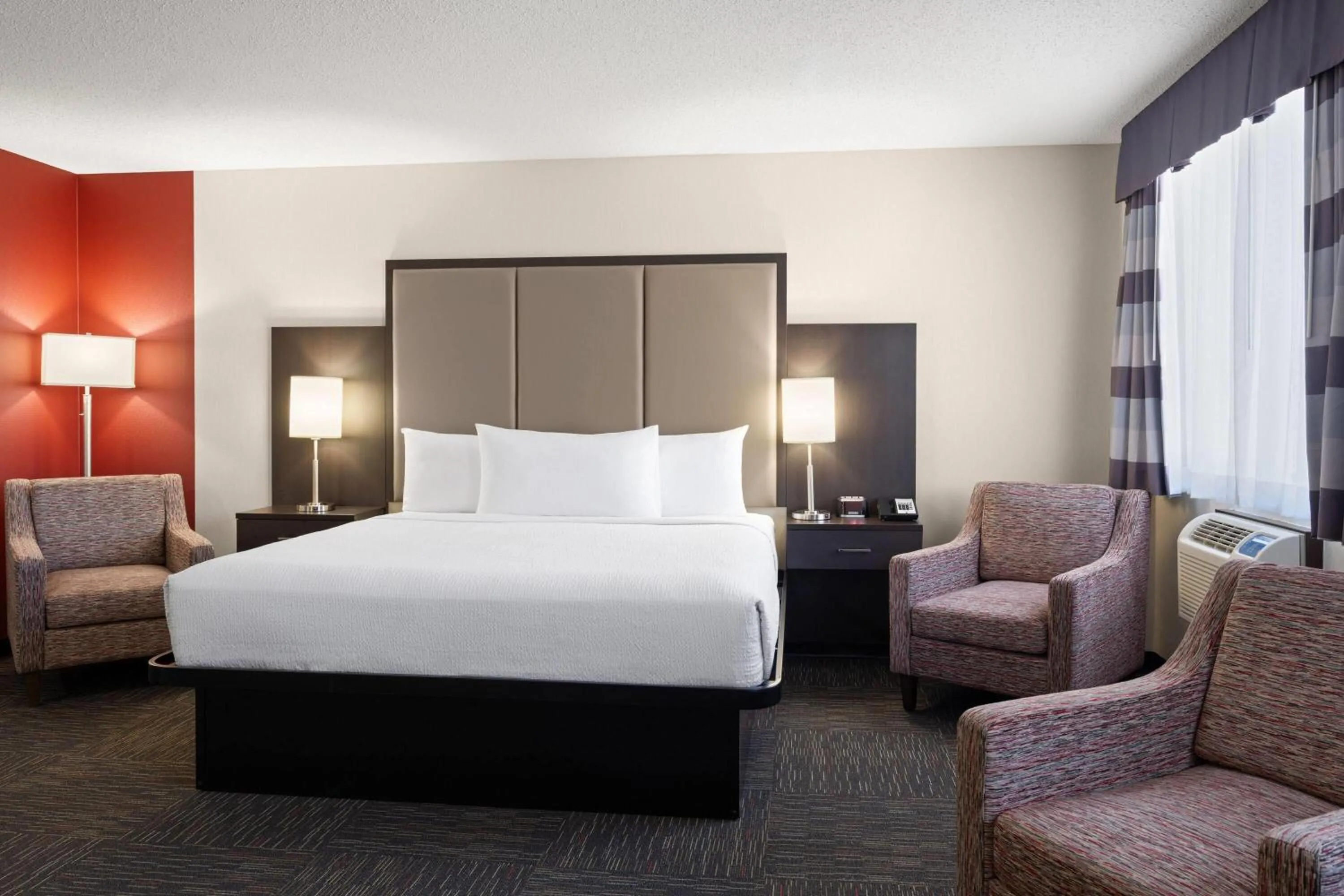 Photo of the whole room, Bed in Ramada by Wyndham Saskatoon