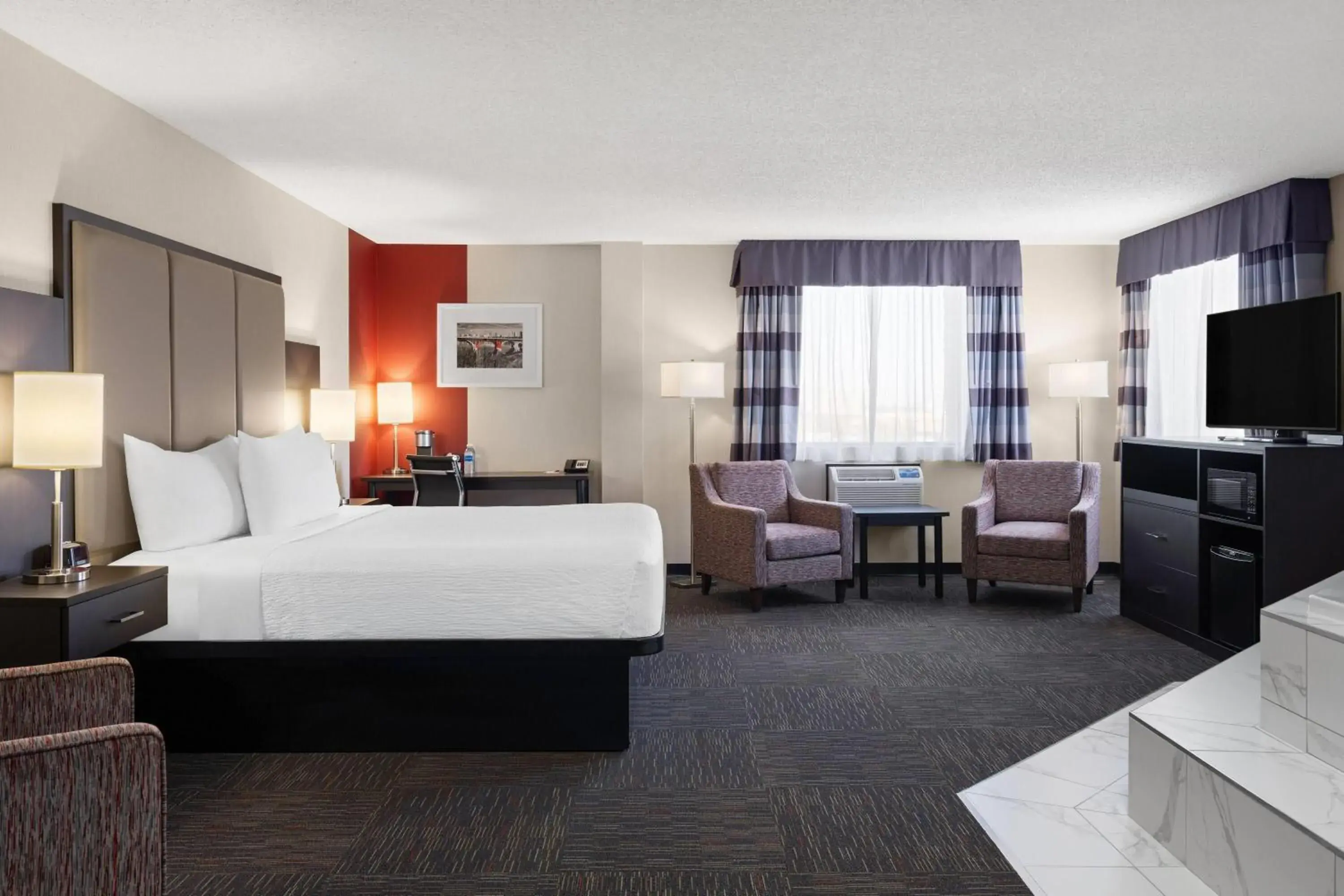 Photo of the whole room, Bed in Ramada by Wyndham Saskatoon Photo of the whole room, Bed in Ramada by Wyndham Saskatoon