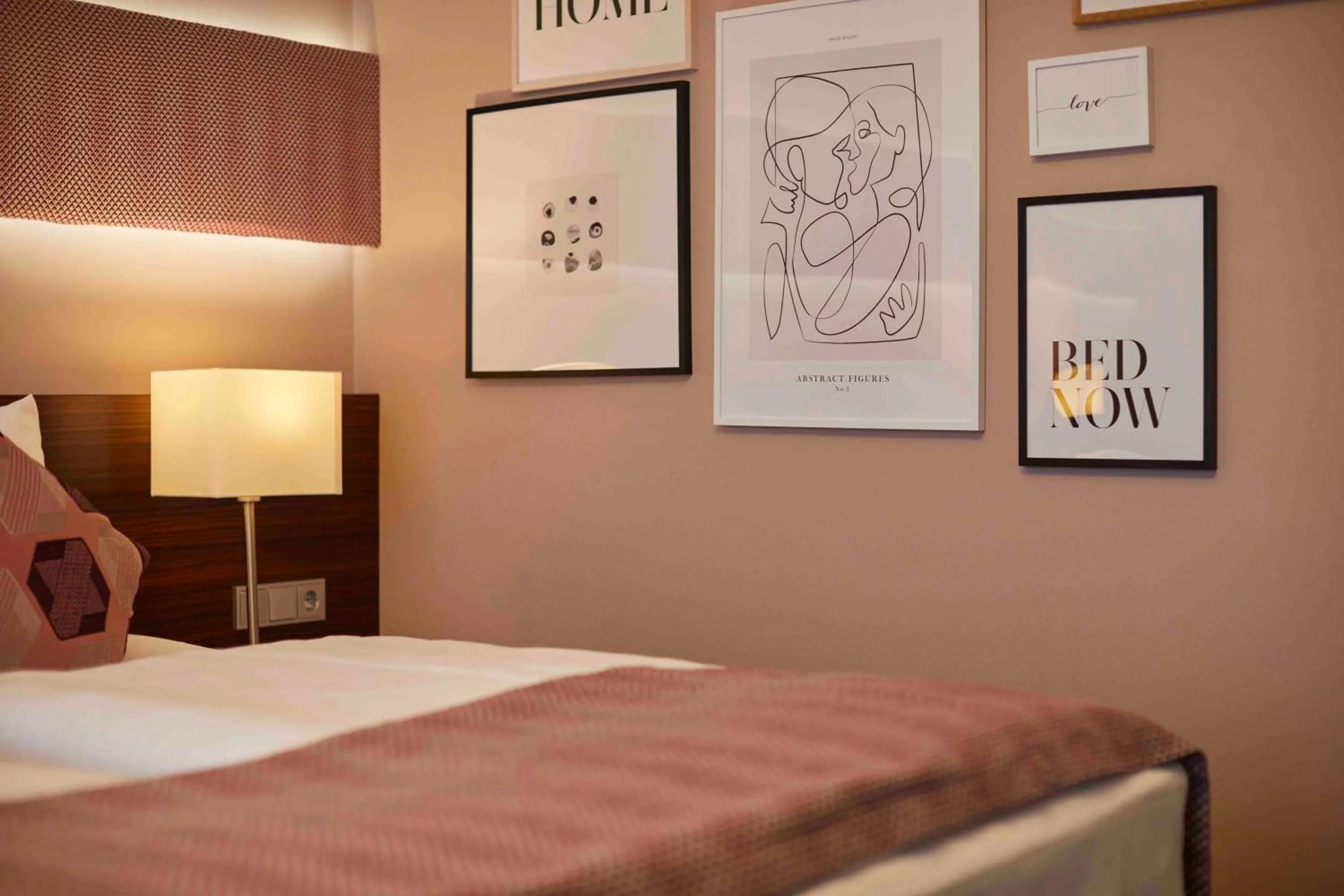 Bed in Hotel Metropol by Maier Privathotels