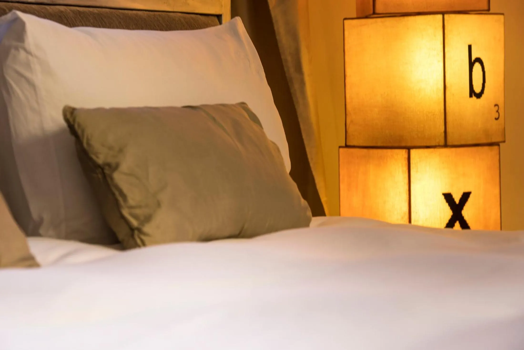 Decorative detail, Bed in Hôtel Particulier Le 28 - Spa & Art Luxury Design by Alain Ducasse