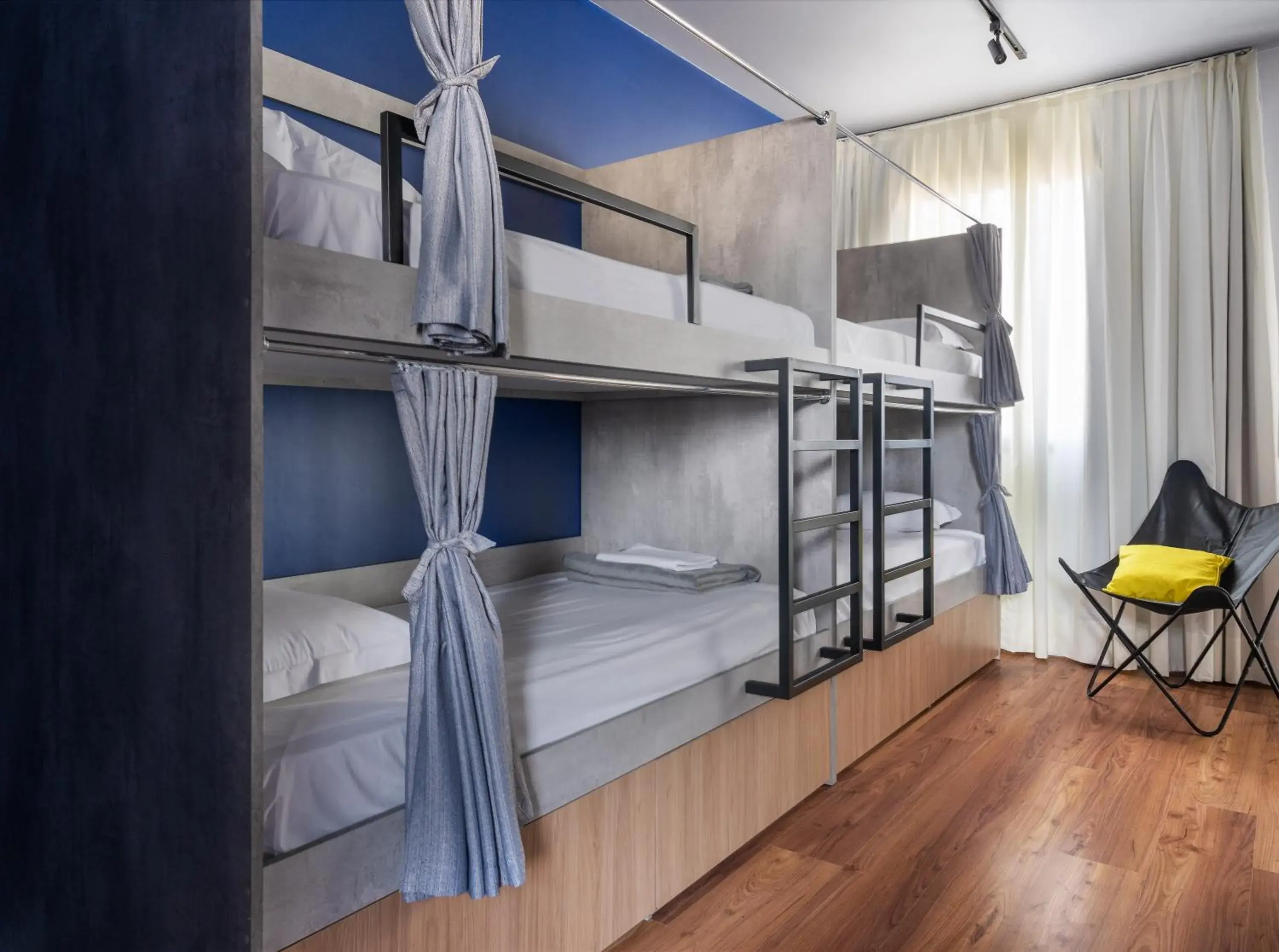 Bunk Bed in Male Dormitory Room in Swan Generation Porto Alegre Bunk Bed in Male Dormitory Room in Swan Generation Porto Alegre