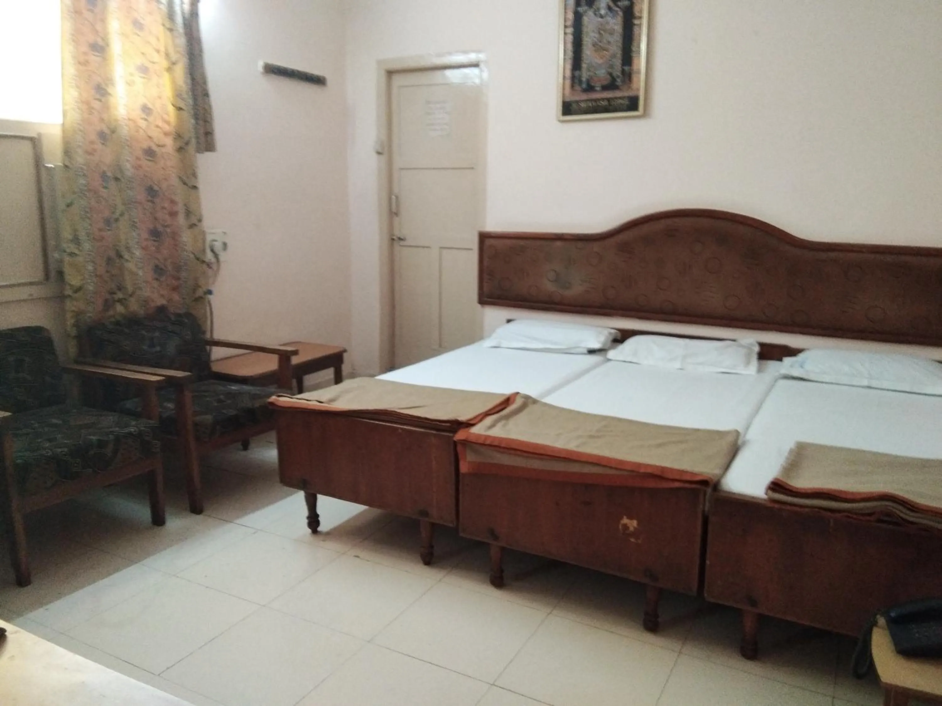 Bedroom in Srinivasa Lodge