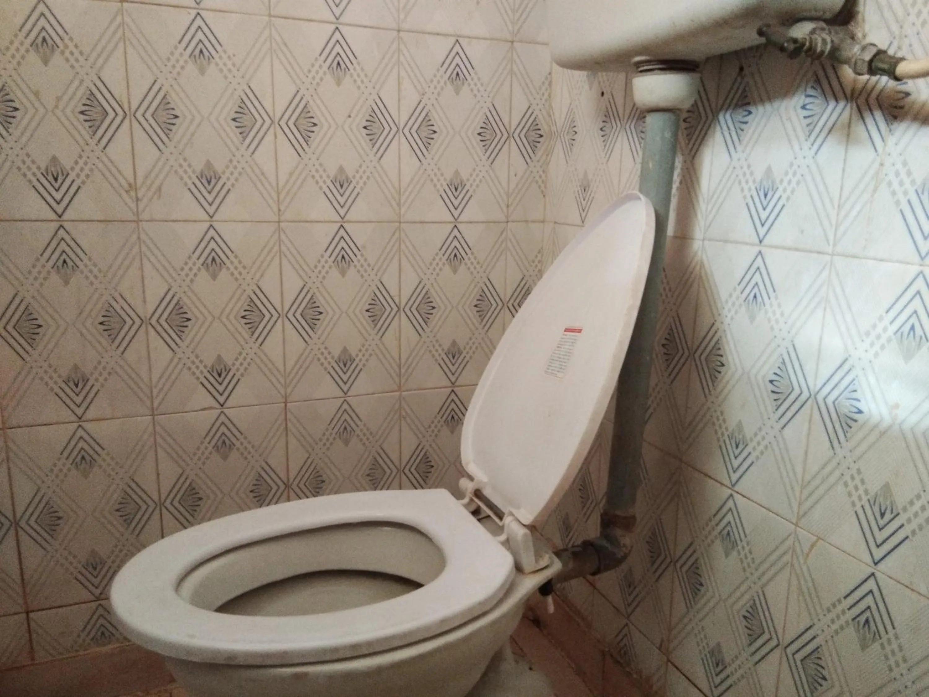 Toilet in Srinivasa Lodge