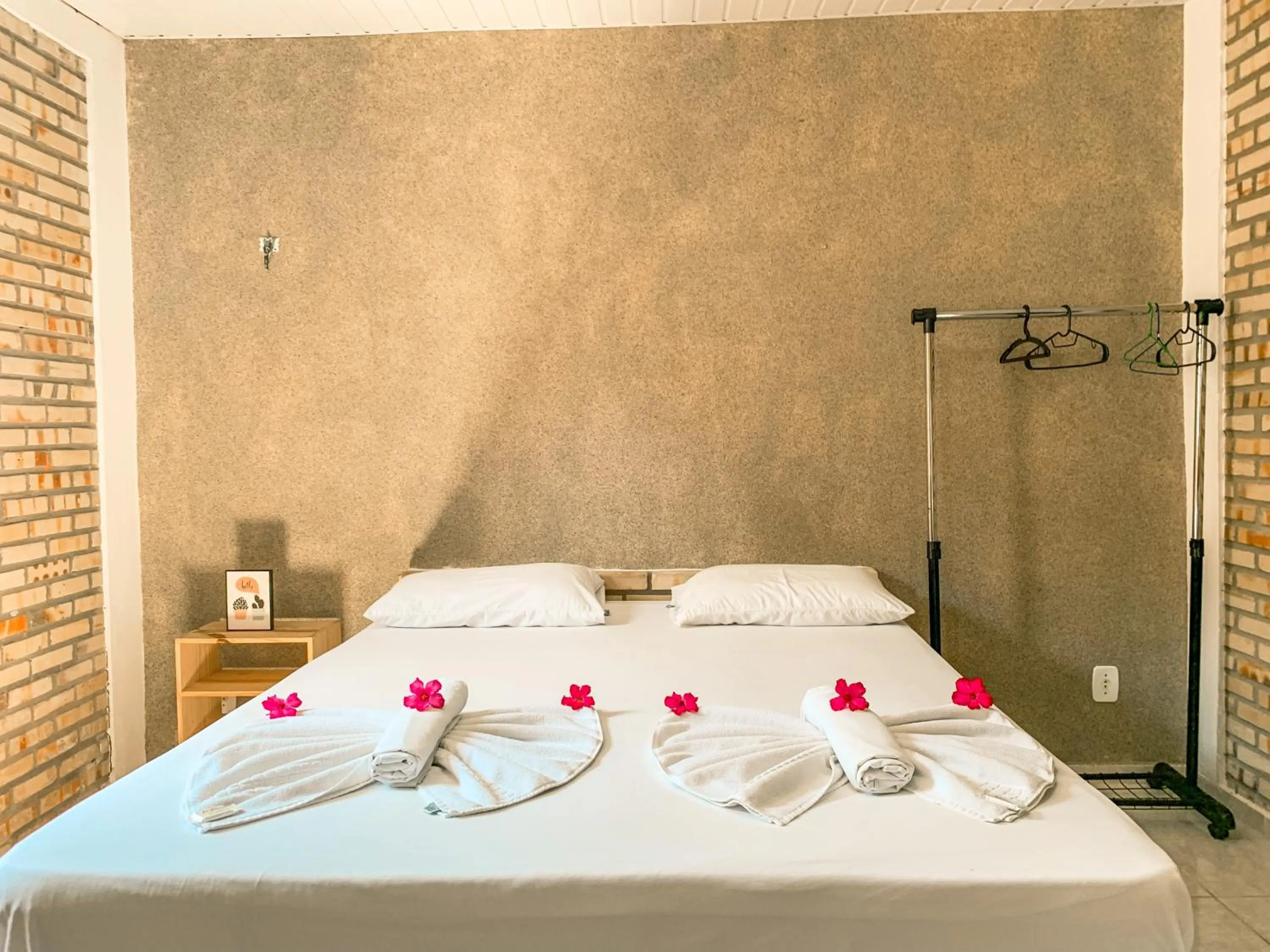 Bed in Pousada La Goduria