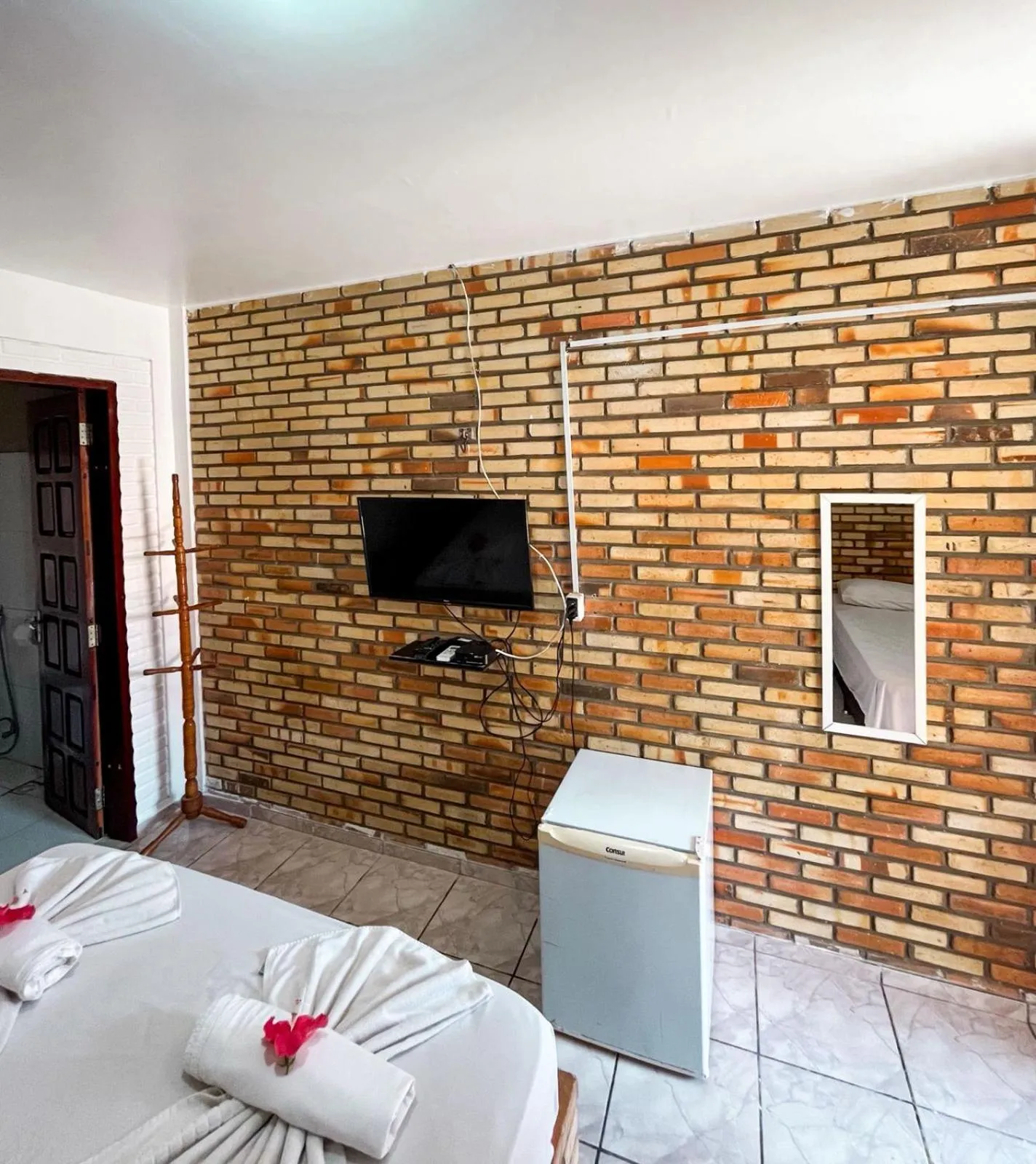 Bed in Pousada La Goduria