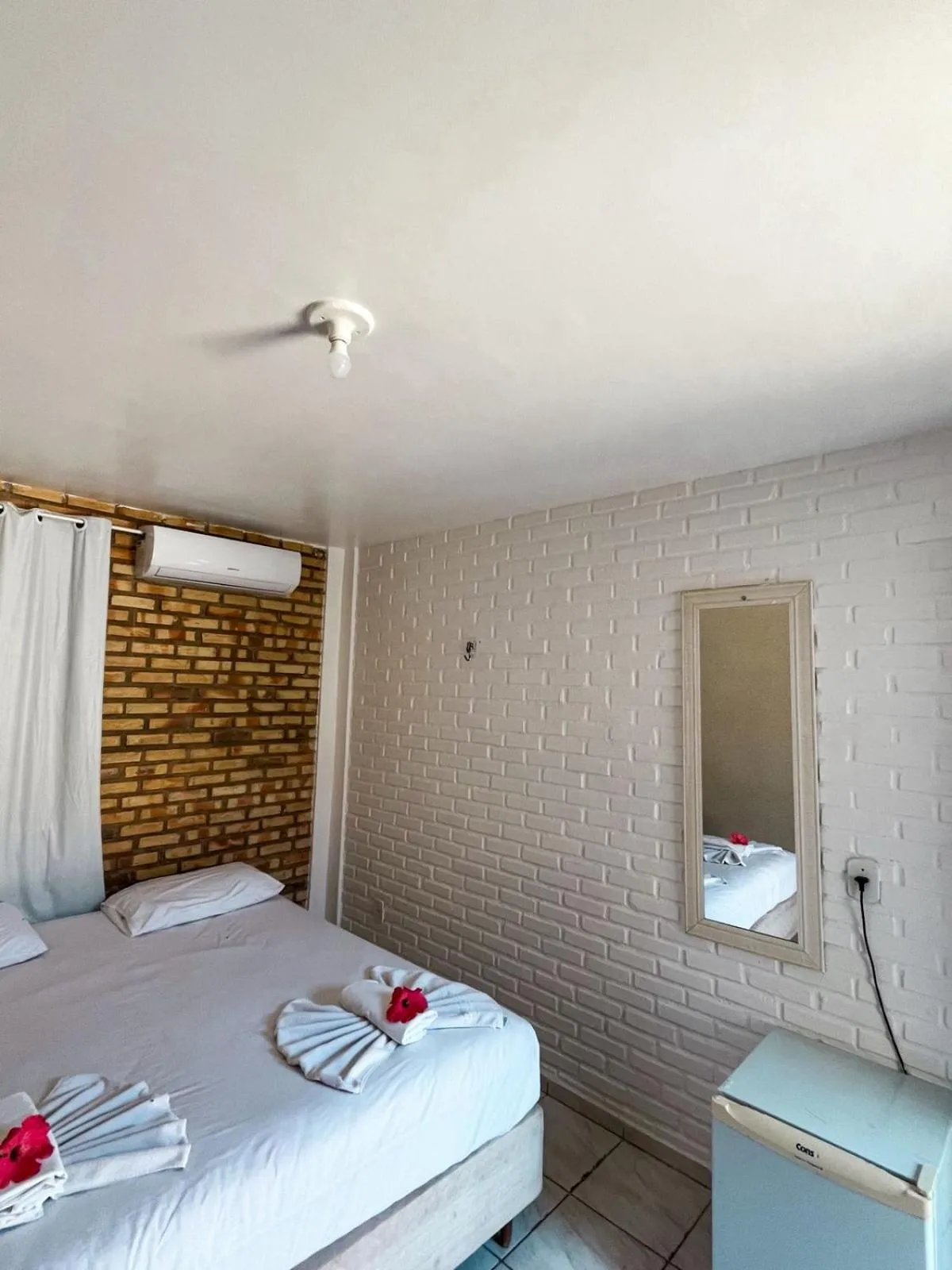 Bed in Pousada La Goduria