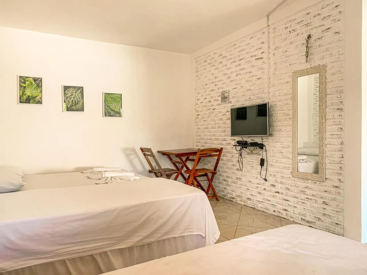 Bed in Pousada La Goduria