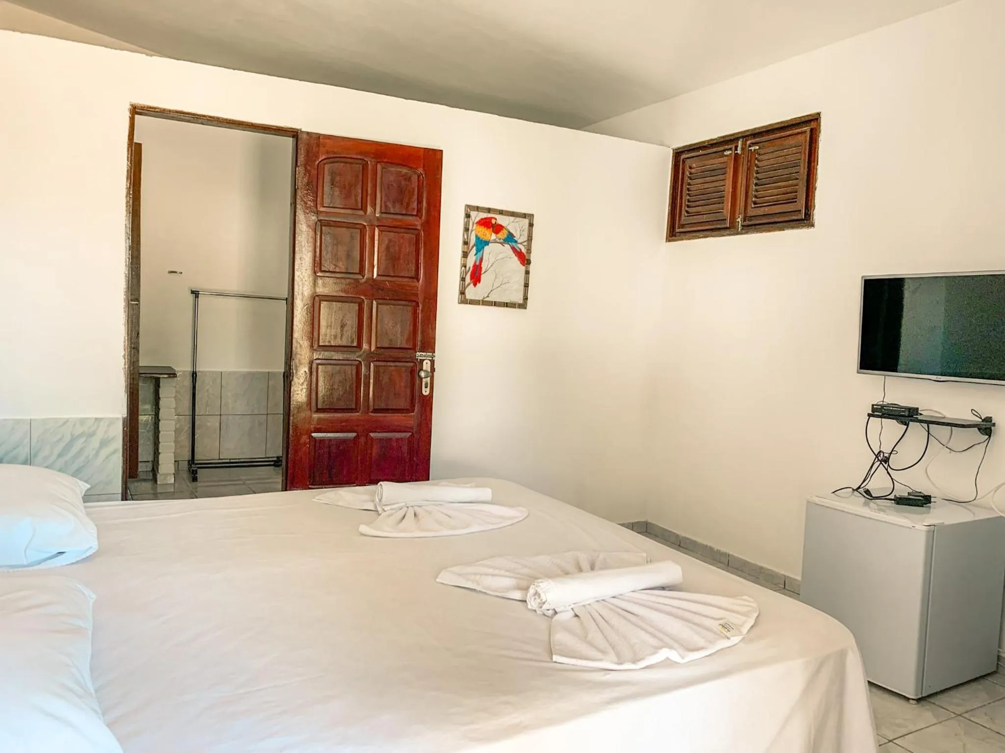 Bed in Pousada La Goduria