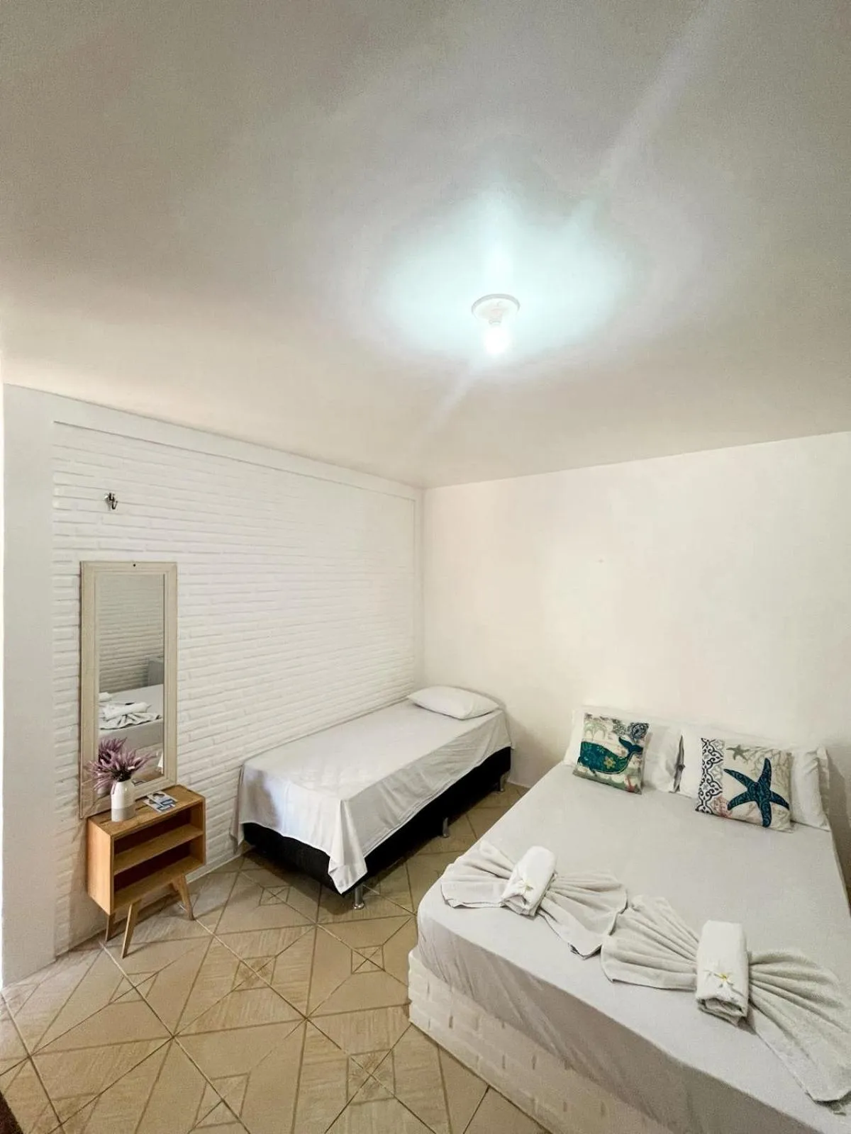 Bed in Pousada La Goduria