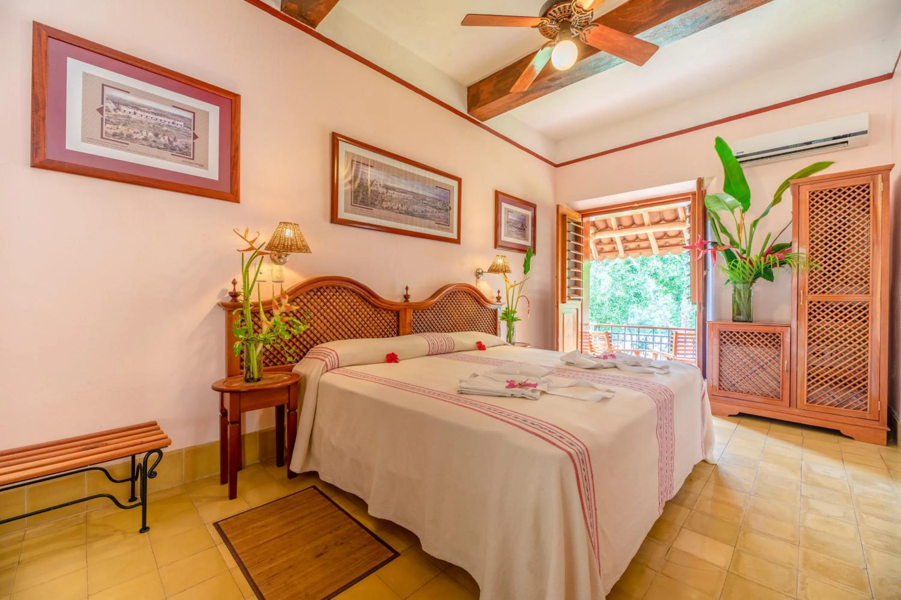 Photo of the whole room, Bed in Hacienda Uxmal Plantation & Museum