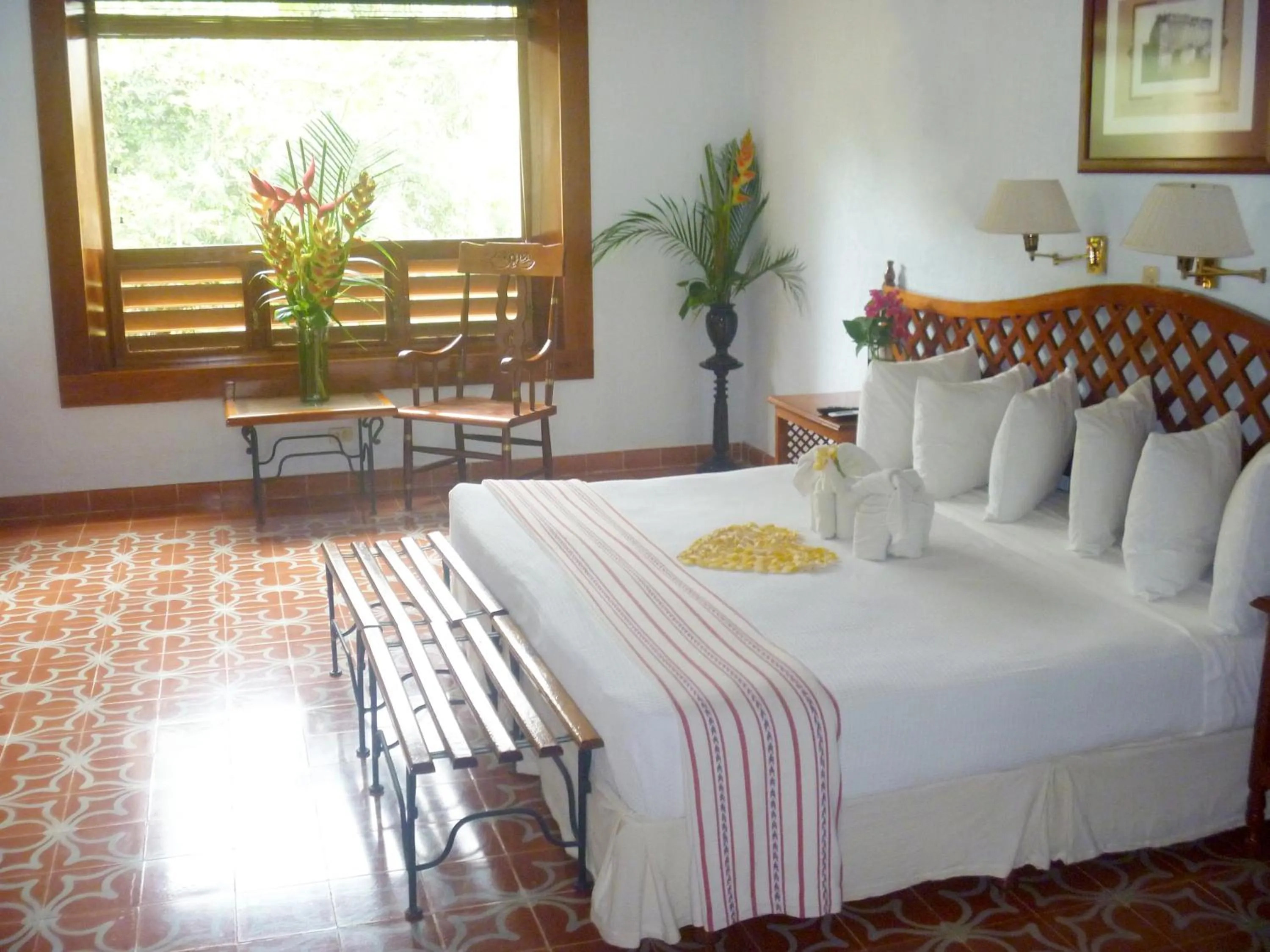 Photo of the whole room, Bed in Hacienda Uxmal Plantation & Museum
