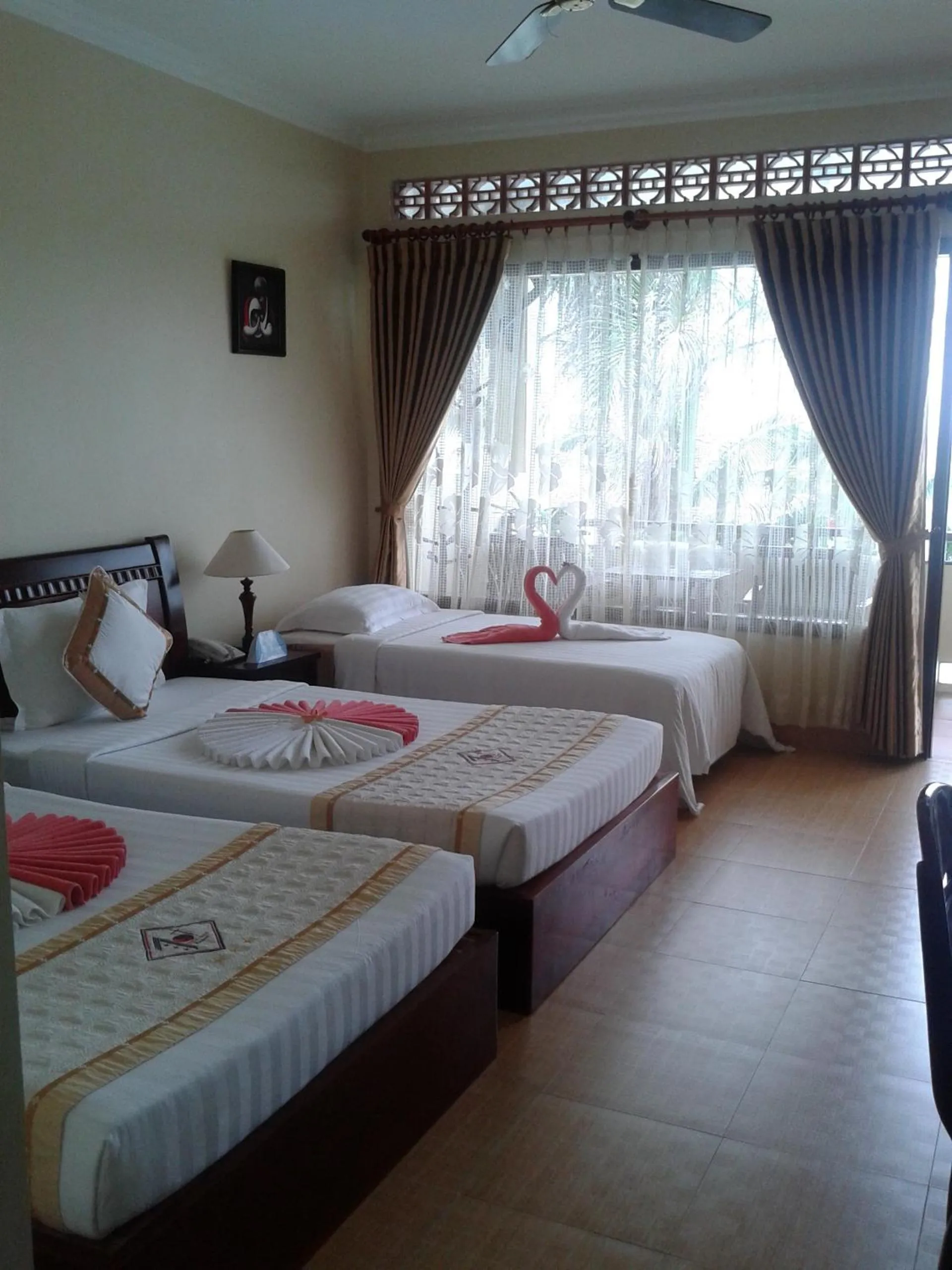 Bed in TIEN DAT MUI NE Resort & Spa