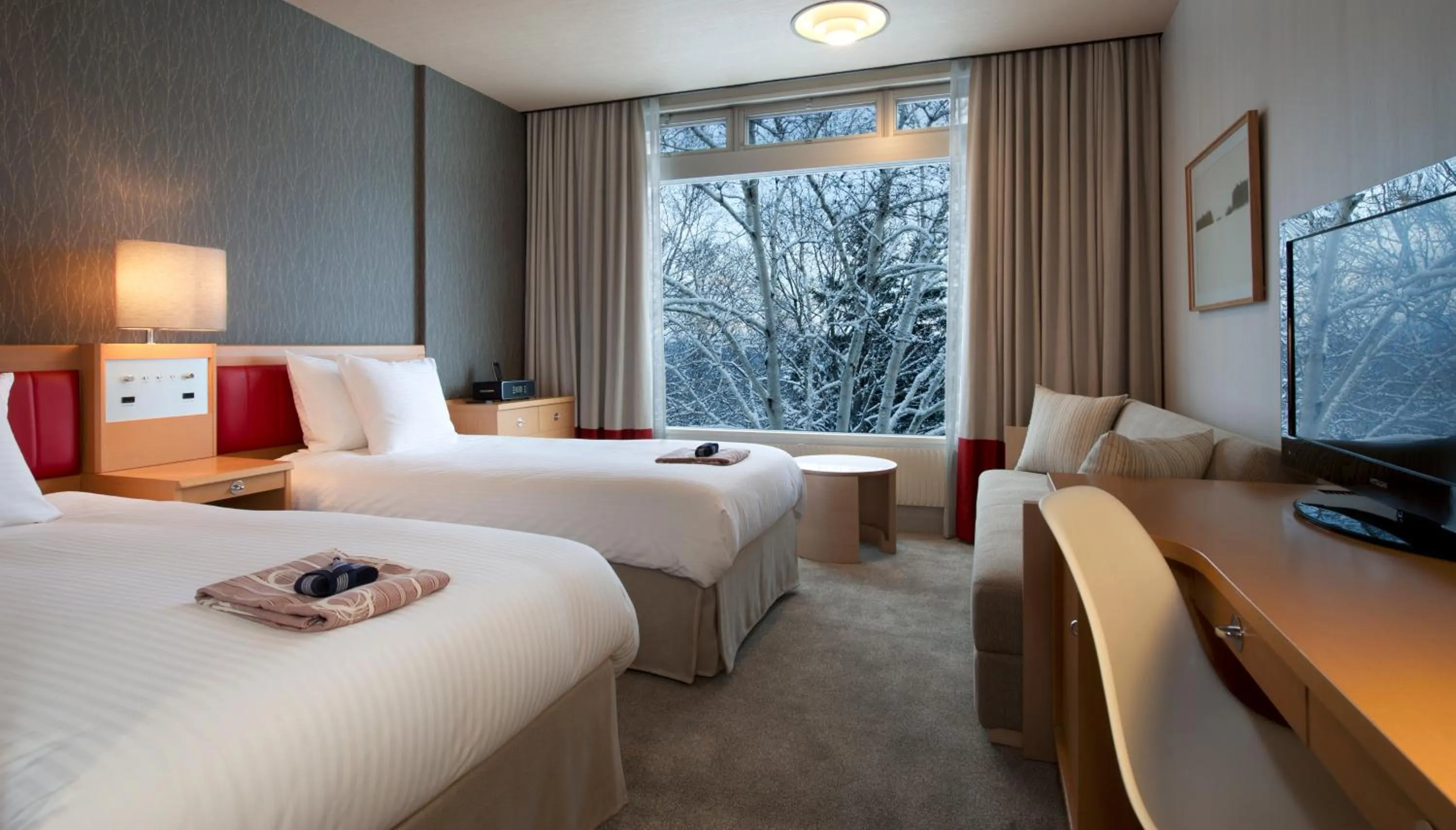 Photo of the whole room, Bed in The Green Leaf Niseko Village, Tapestry Collection by Hilton