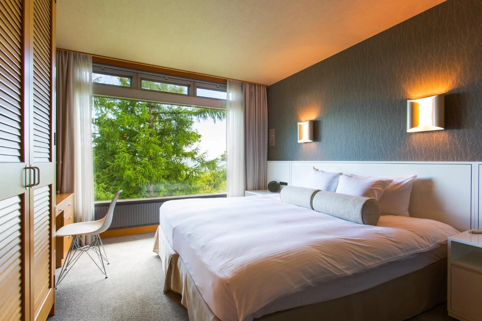 Bed in The Green Leaf Niseko Village, Tapestry Collection by Hilton