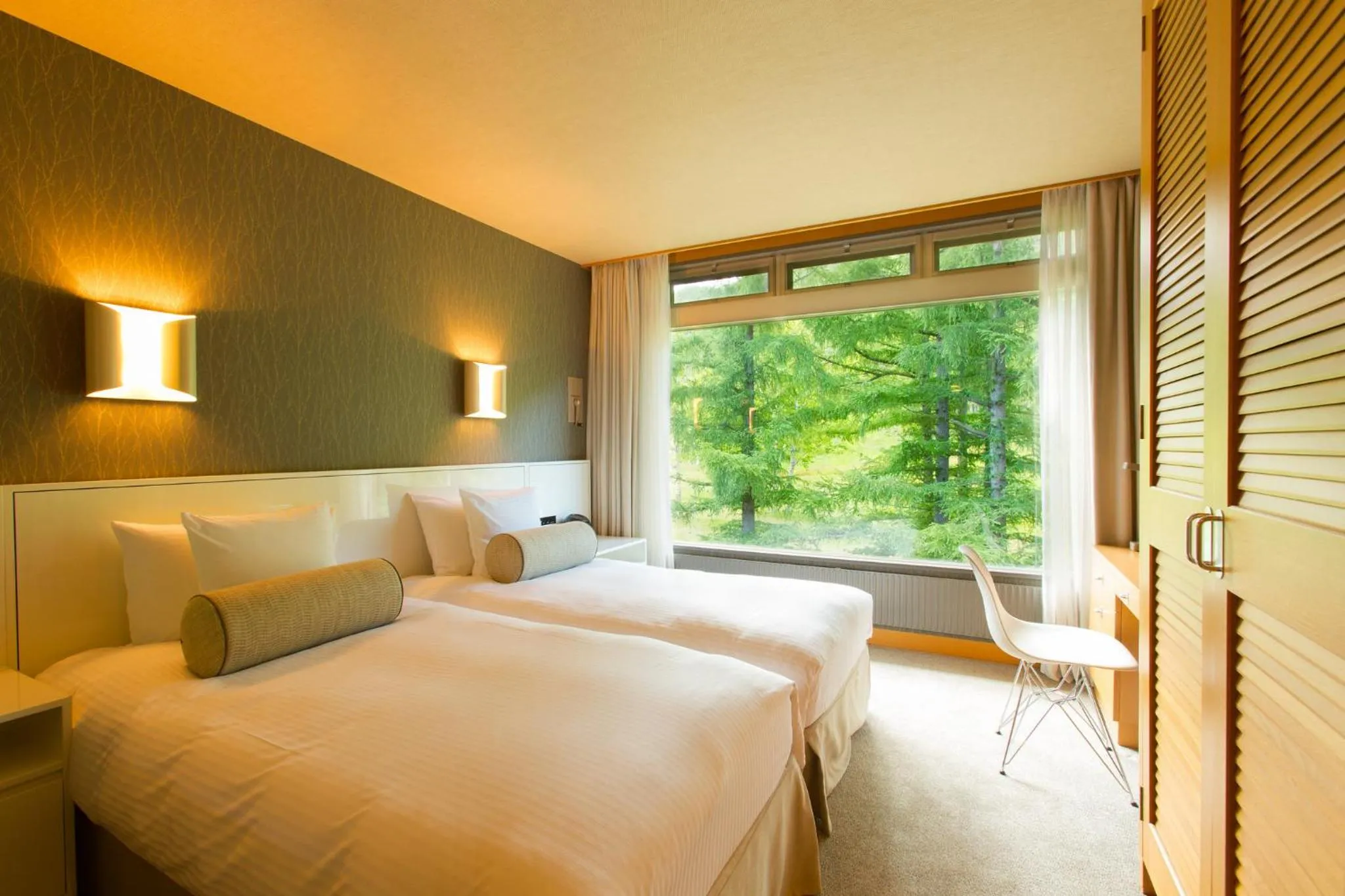 Bed in The Green Leaf Niseko Village, Tapestry Collection by Hilton