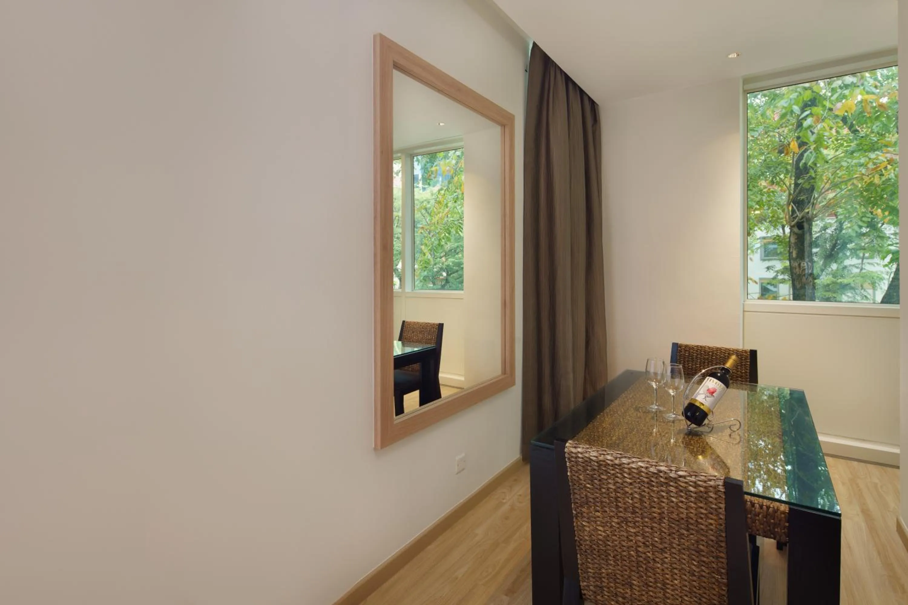 Dining area in Park Regis by Prince Singapore