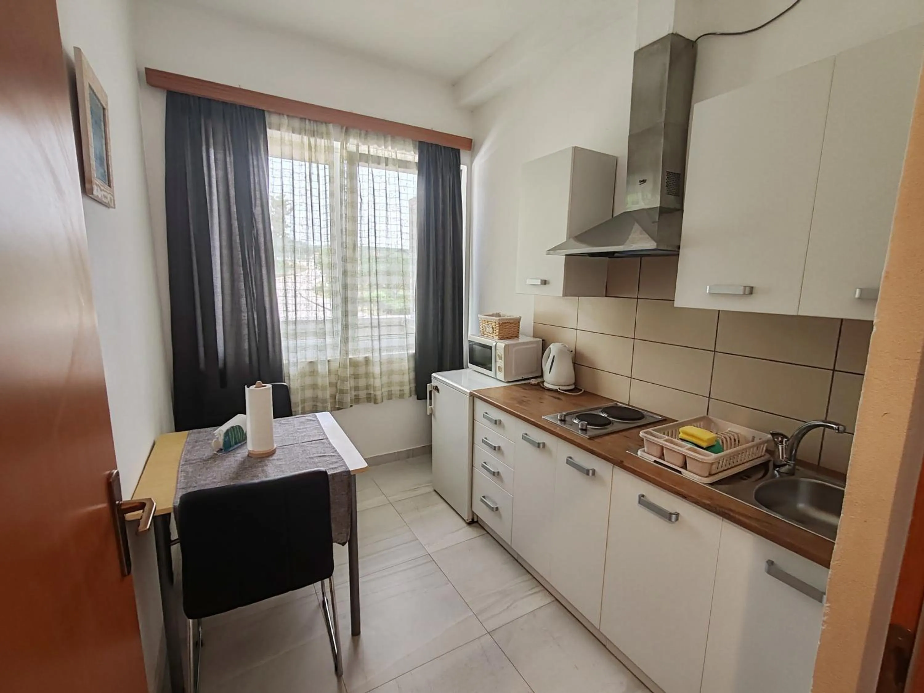 Kitchen or kitchenette in Apartments and pansion M&R