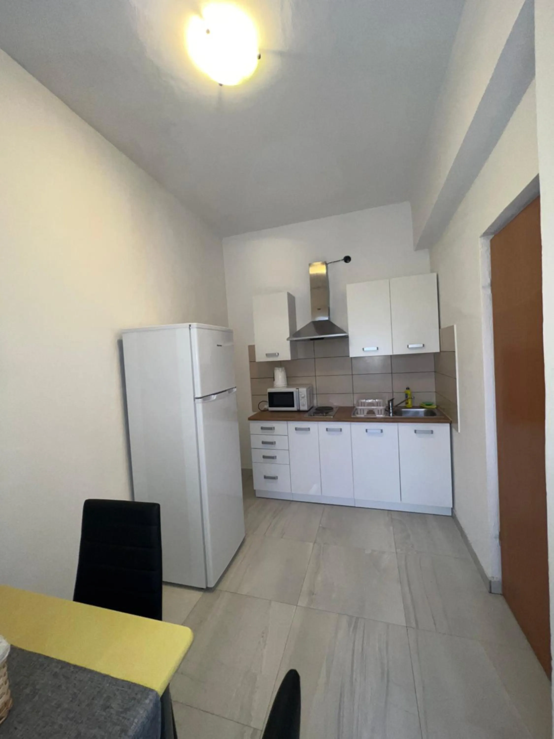 Kitchen or kitchenette in Apartments and pansion M&R