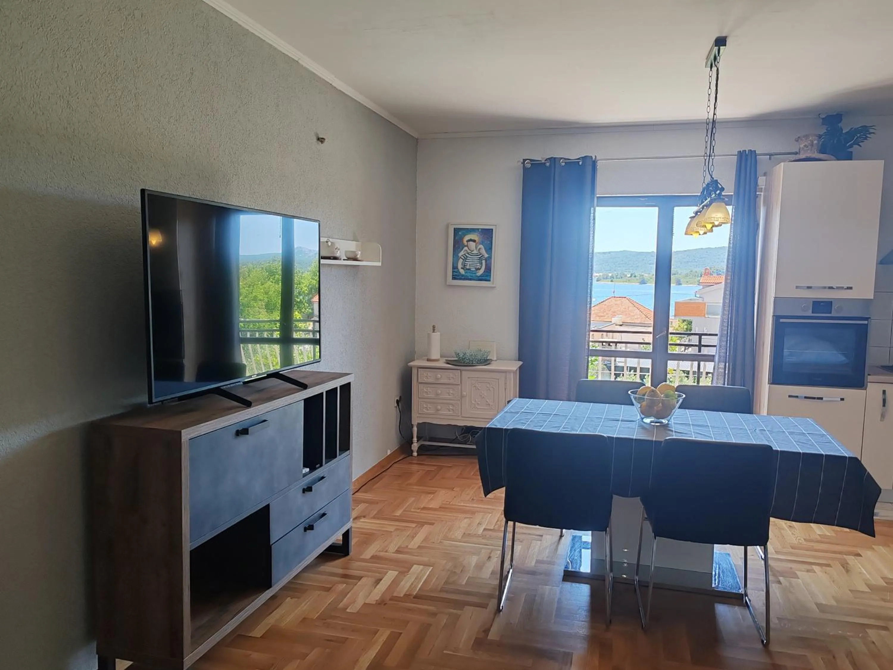 Communal lounge/ TV room in Apartments and pansion M&R